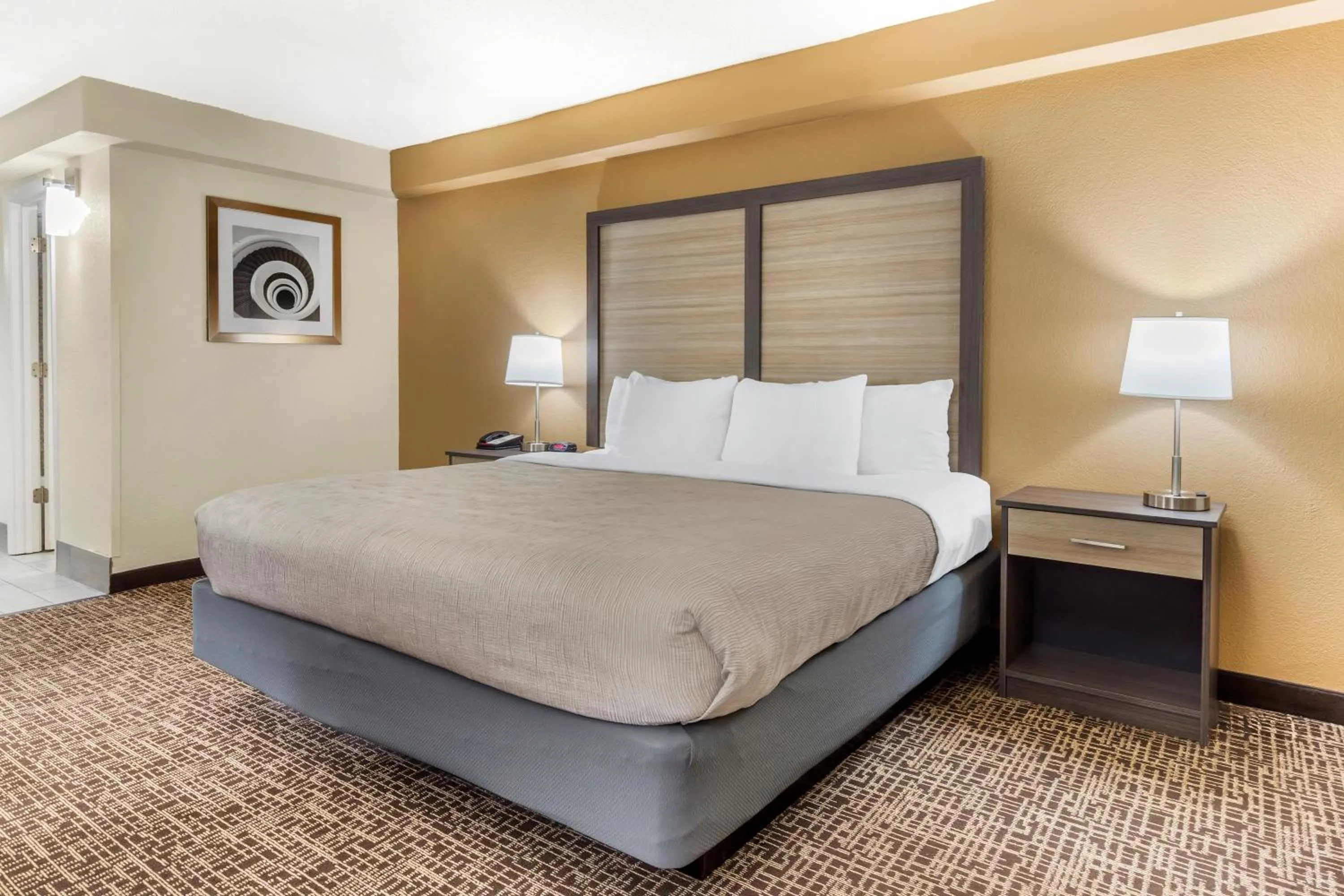 Bed in Quality Inn & Suites Spring Lake - Fayetteville near Fort Bragg