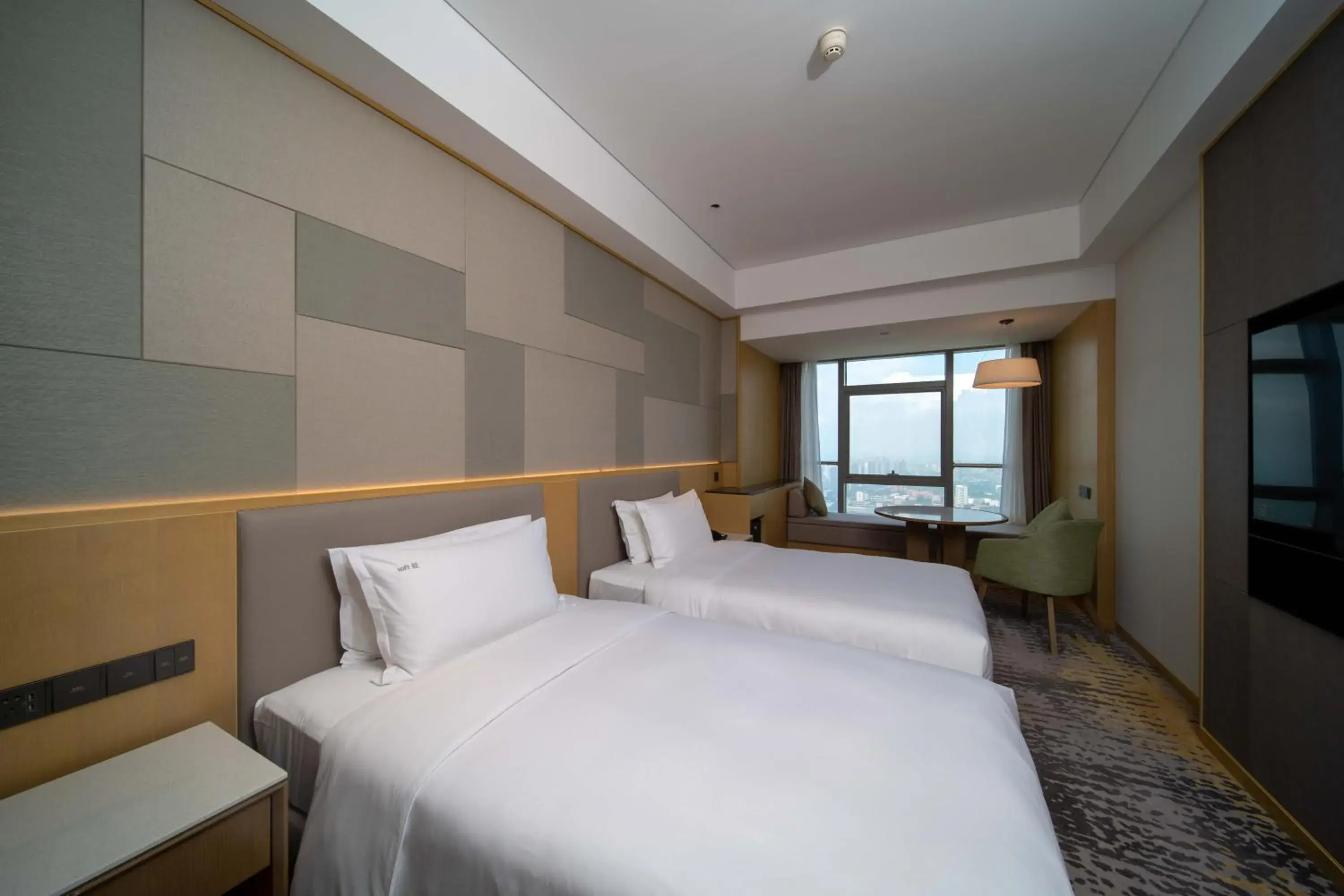 Standard Double Room with Two Double Beds and Sunrise View in Holiday Inn Qinhuangdao Haigang Standard Double Room with Two Double Beds and Sunrise View in Holiday Inn Qinhuangdao Haigang