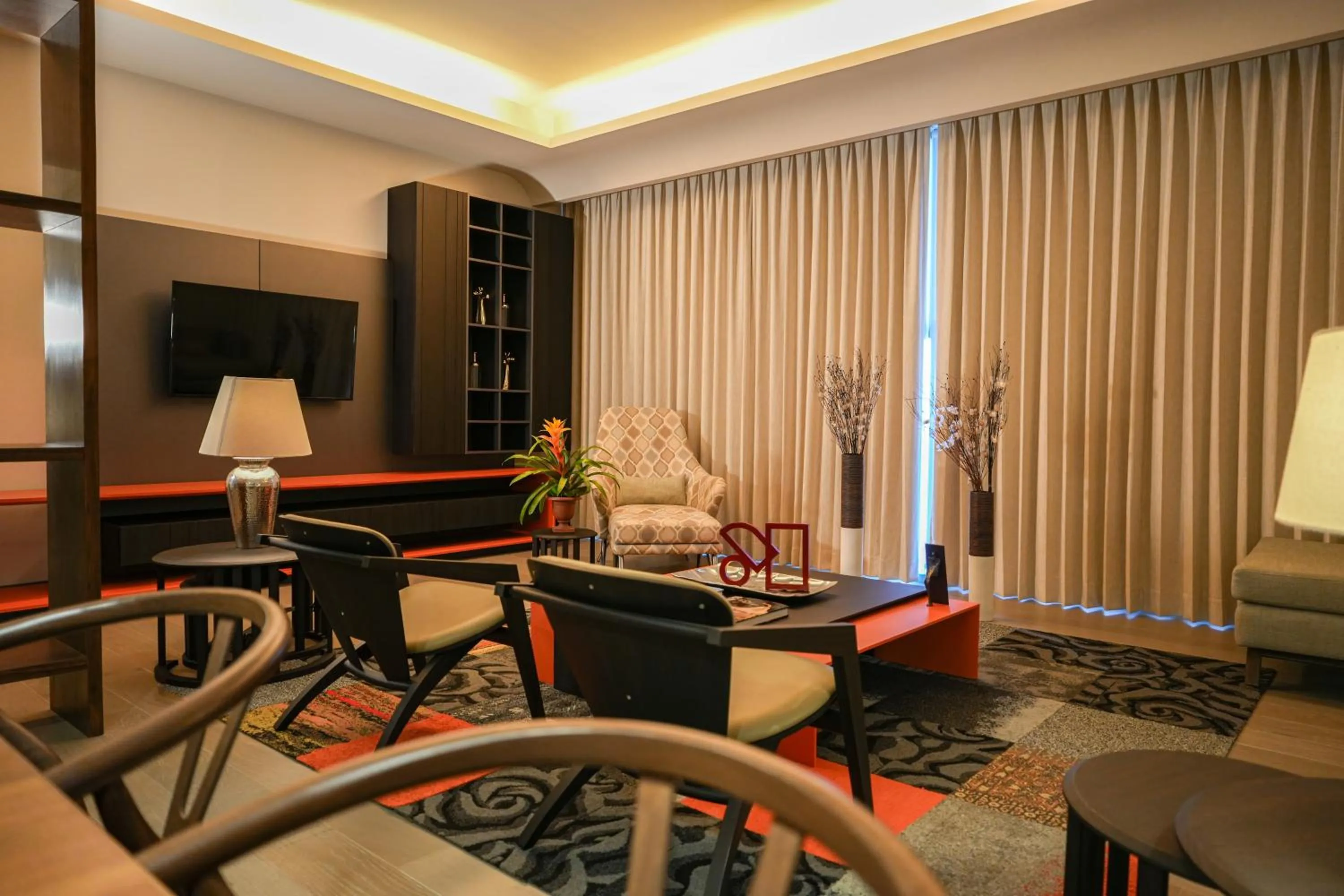 Communal lounge/ TV room in Metria Hotel