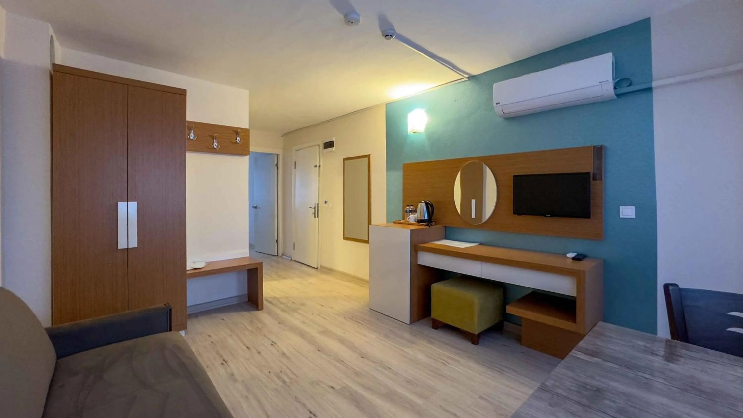 Living room, Bed in La Bella Suit Otel