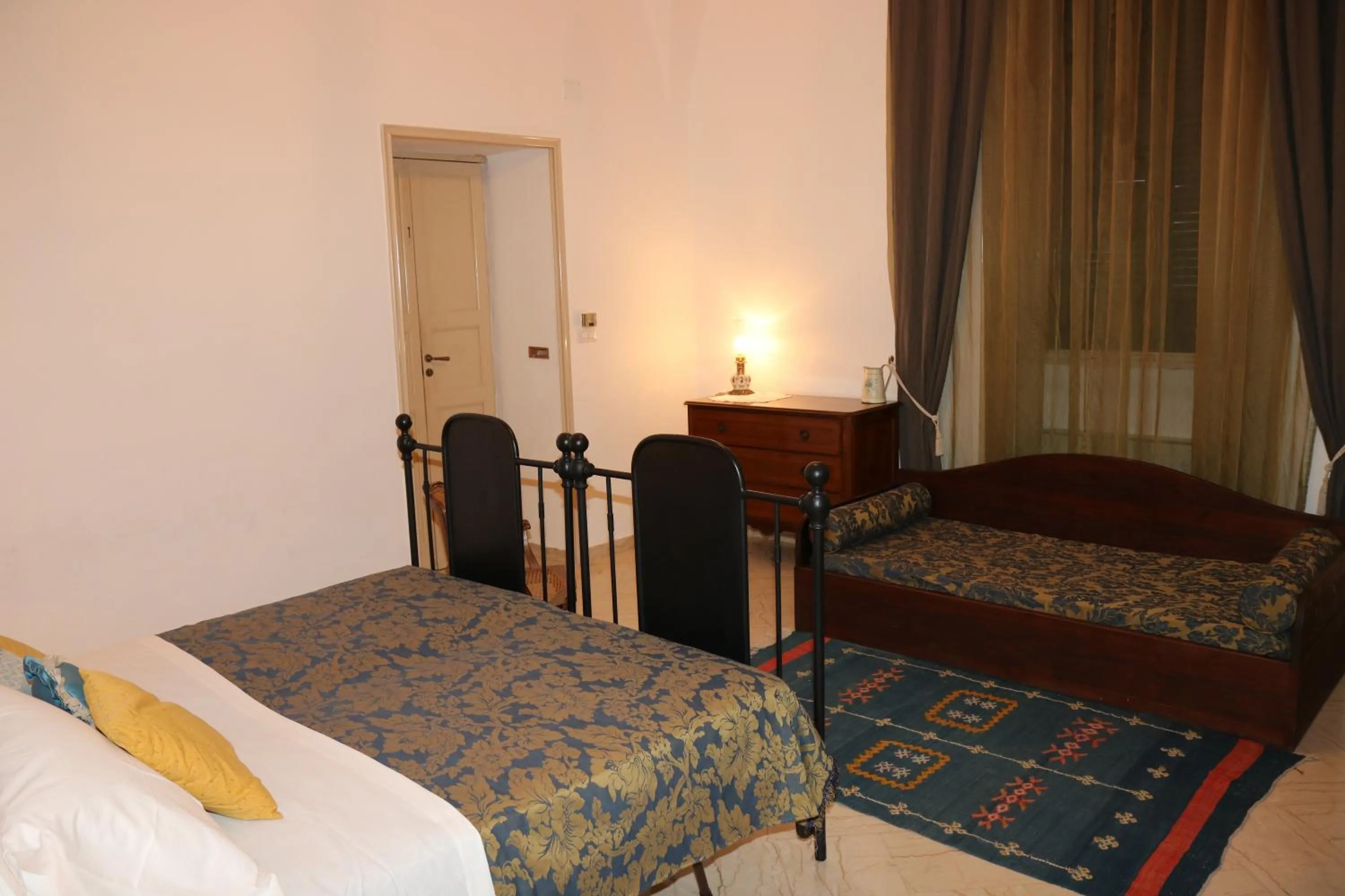 Bed in B&B Il Giardino di Paola