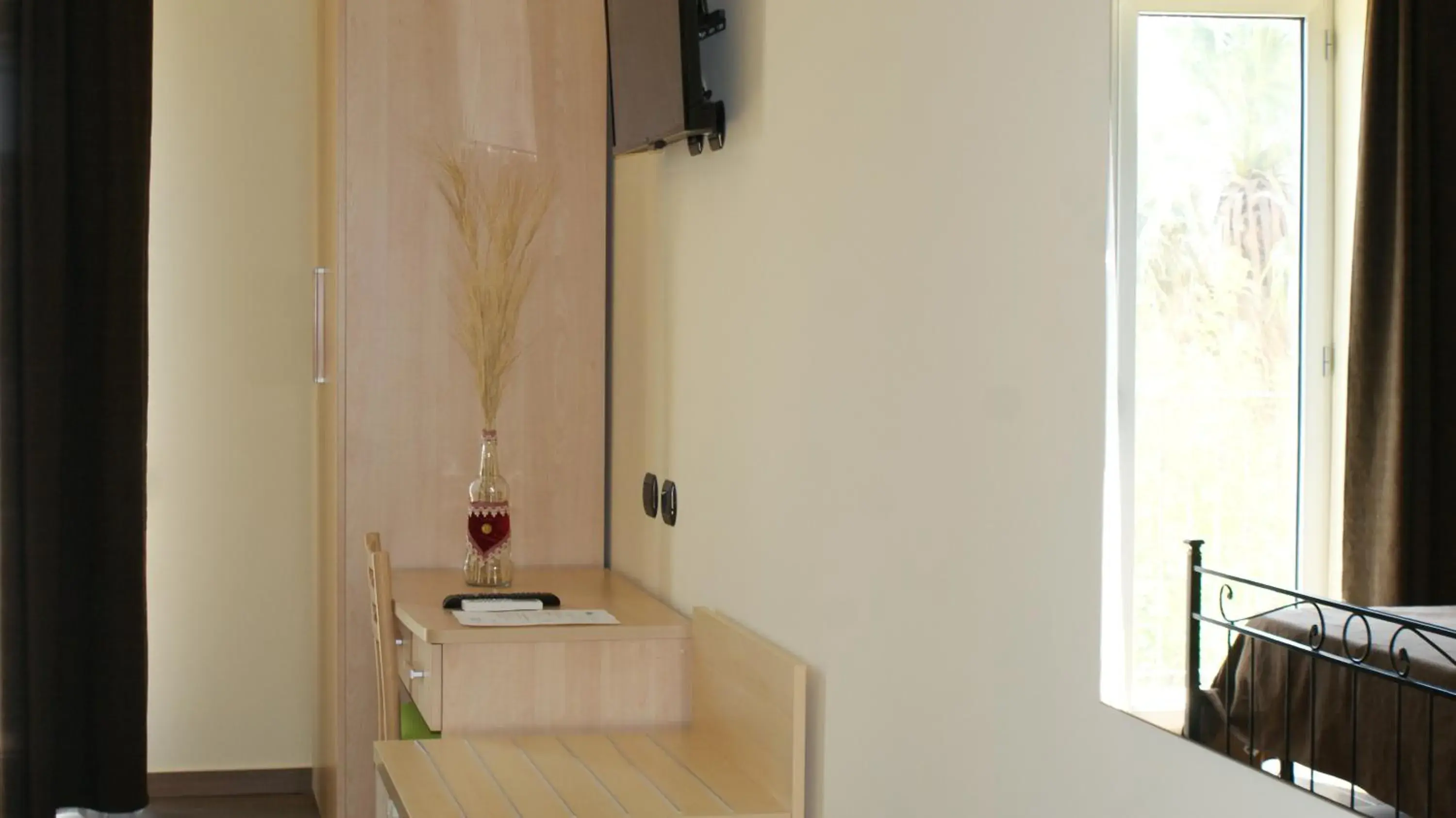 Comfort Quadruple Room in Mimí Hotel Comfort Quadruple Room in Mimí Hotel