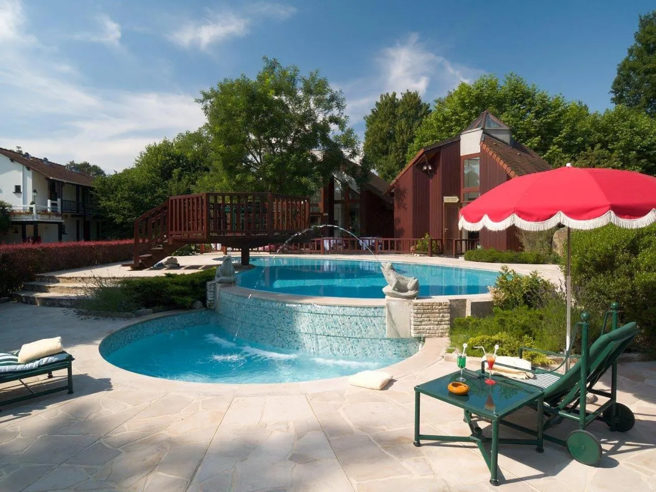 Swimming pool in Hôtellerie Du Bas-Bréau