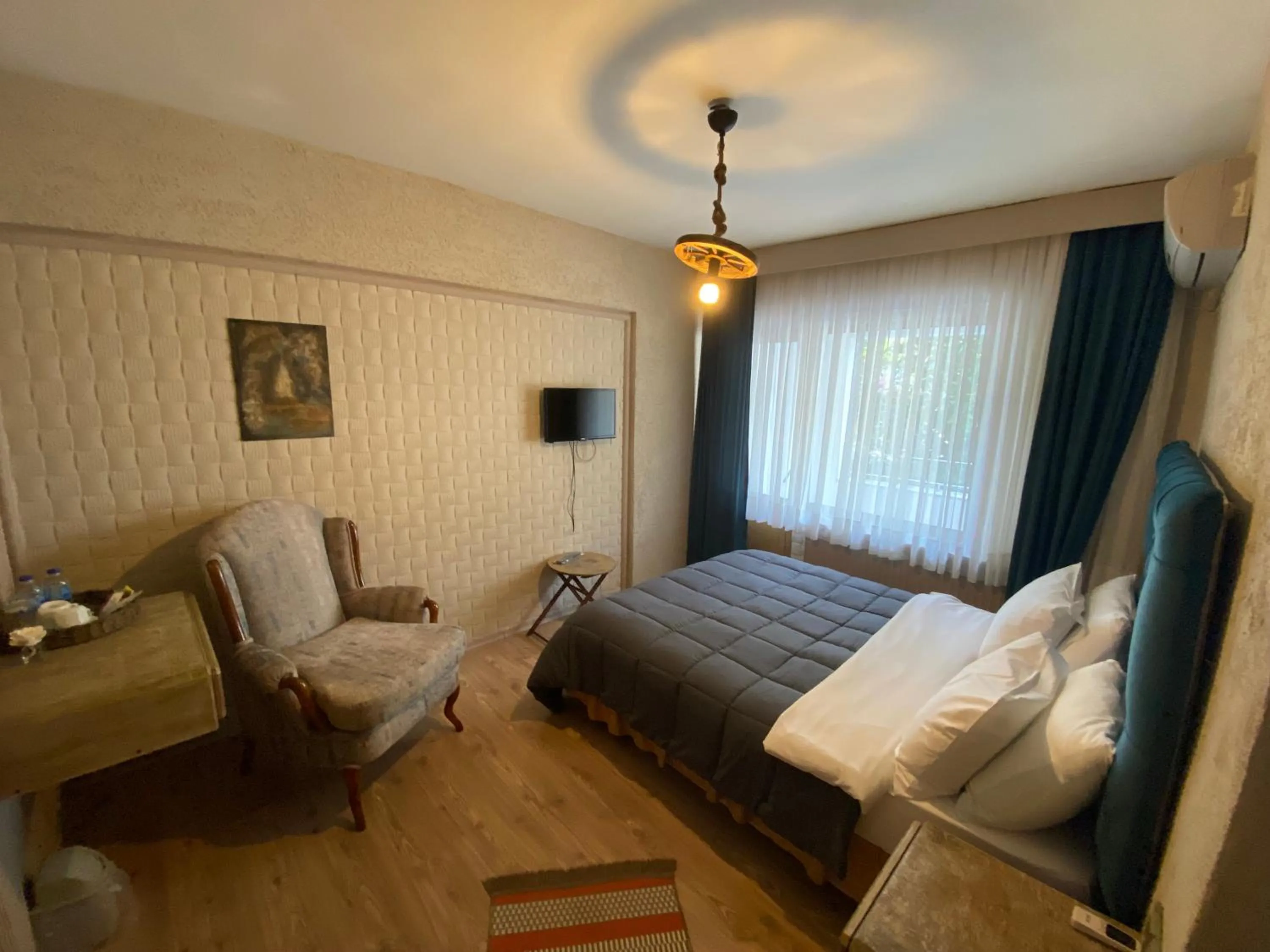 Bed in EVİM APART HOTEL