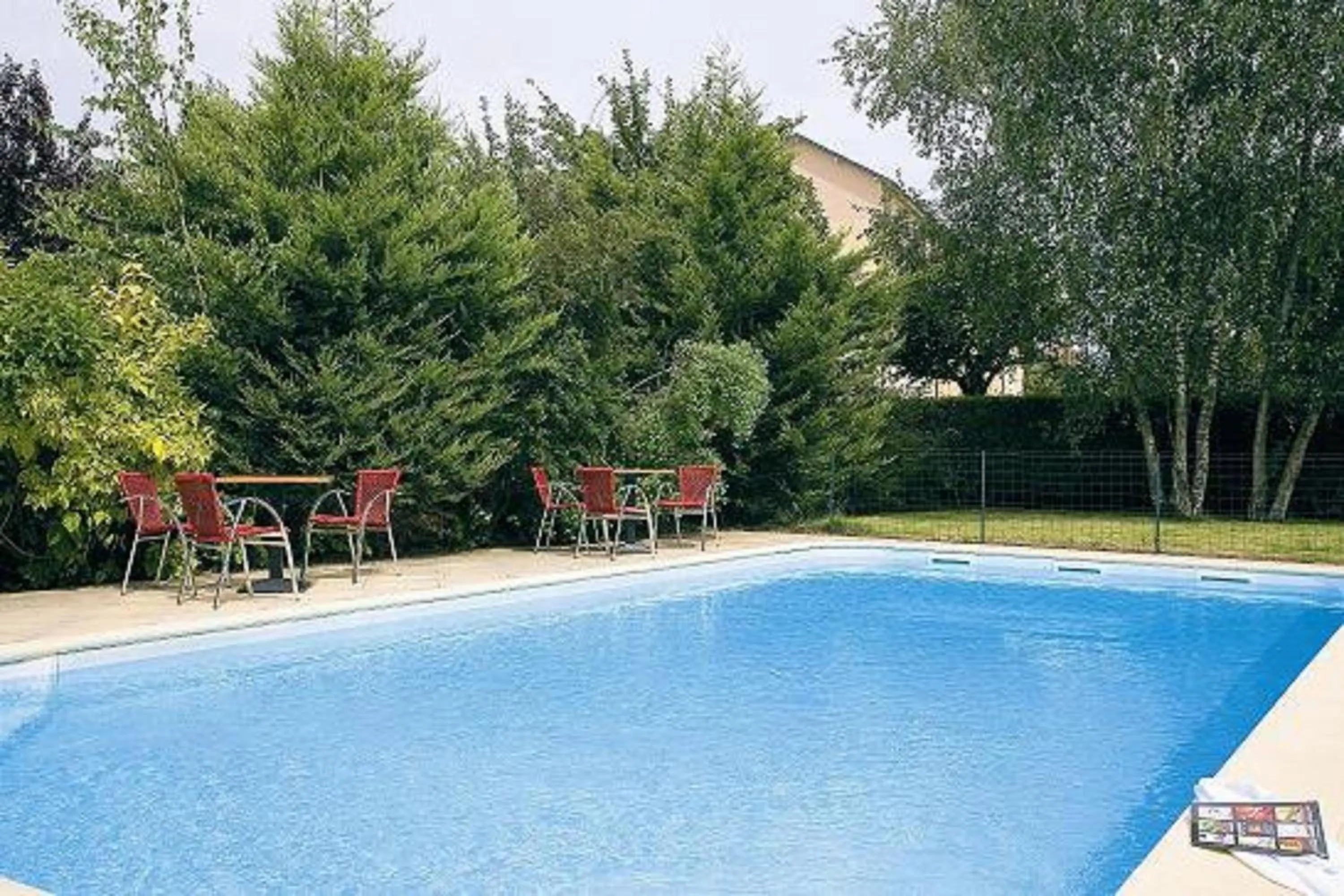 Swimming pool in Logis Les Provinciales