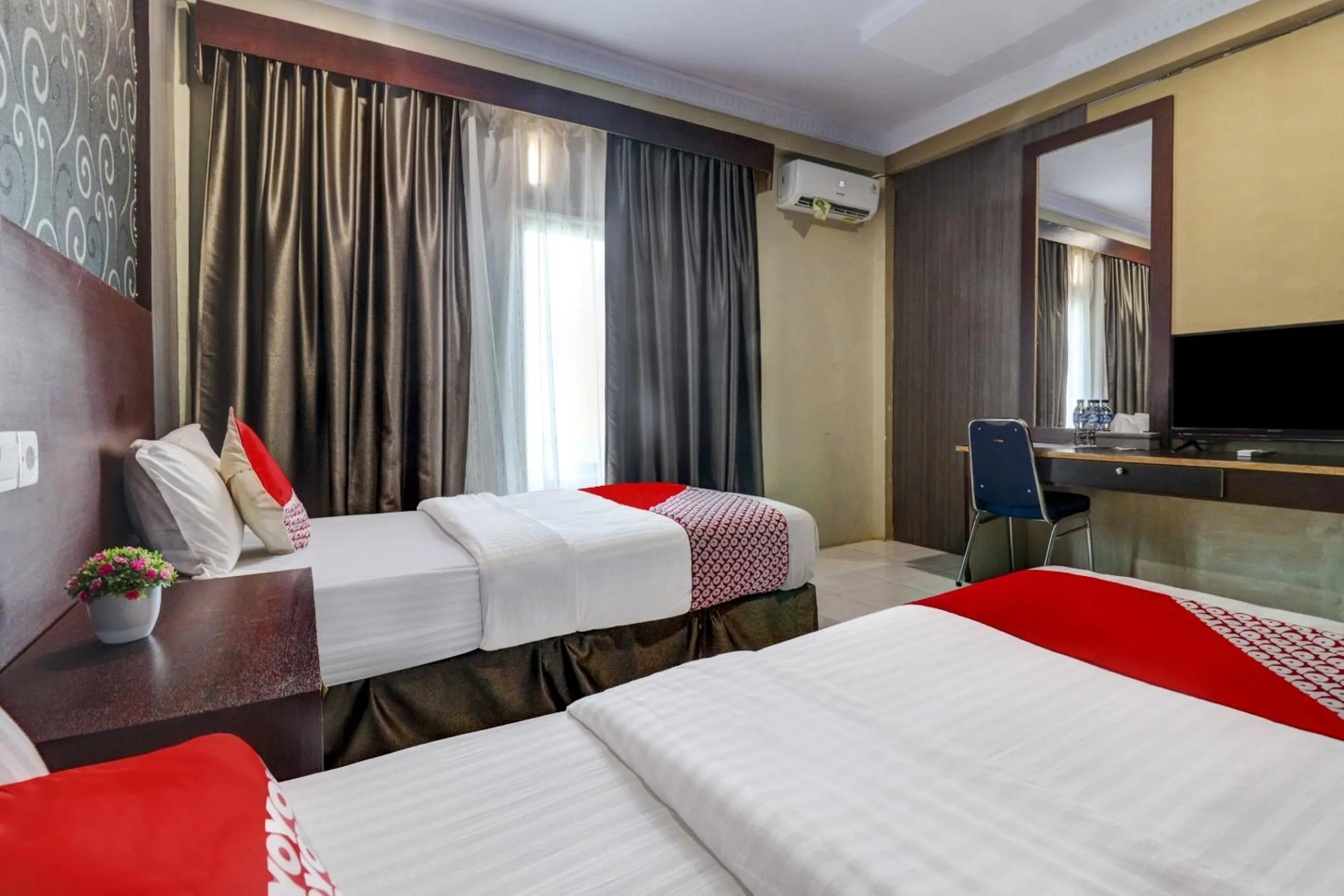 Bedroom in Collection O 90564 Hotel Merangin Syariah