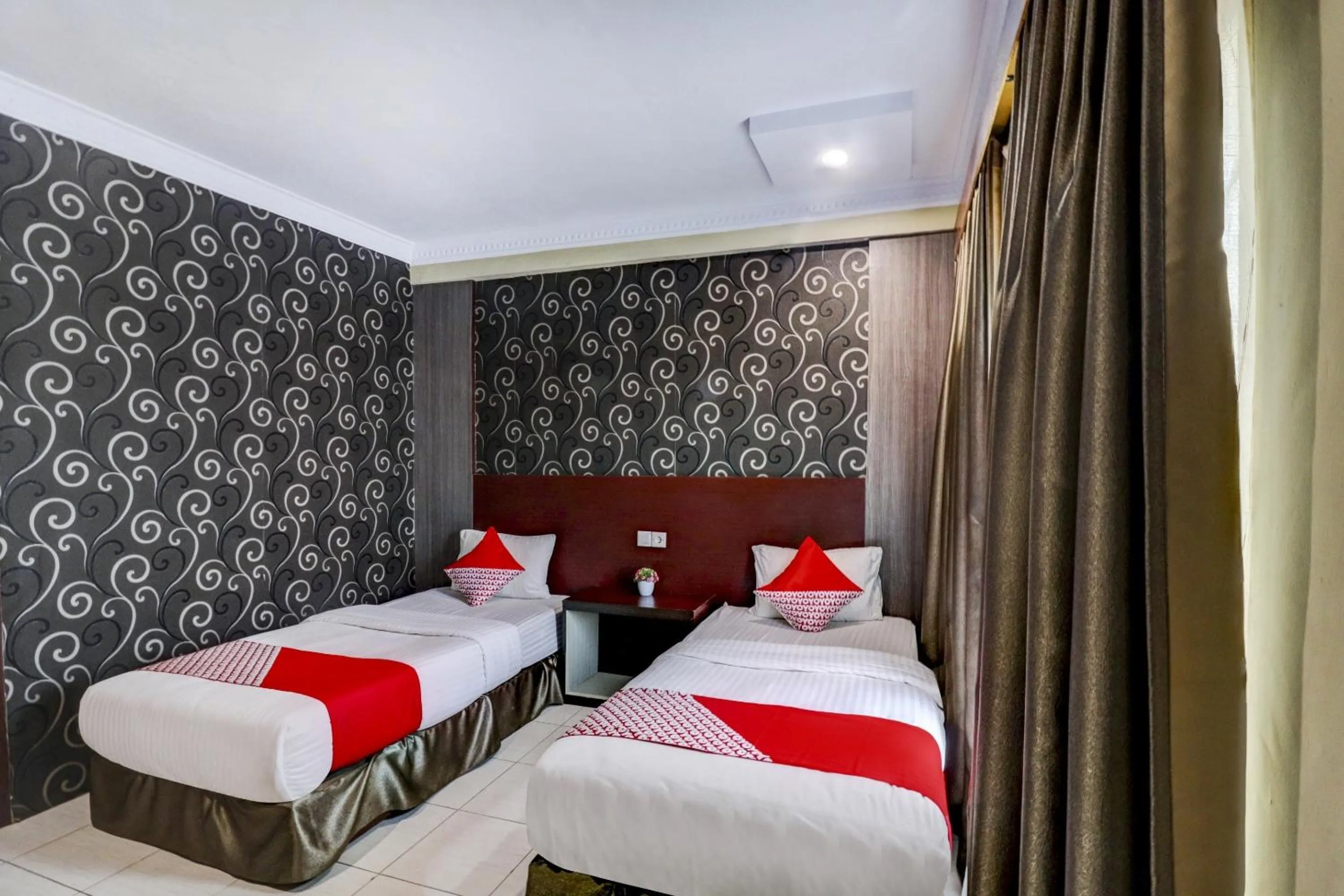 Bedroom in Collection O 90564 Hotel Merangin Syariah