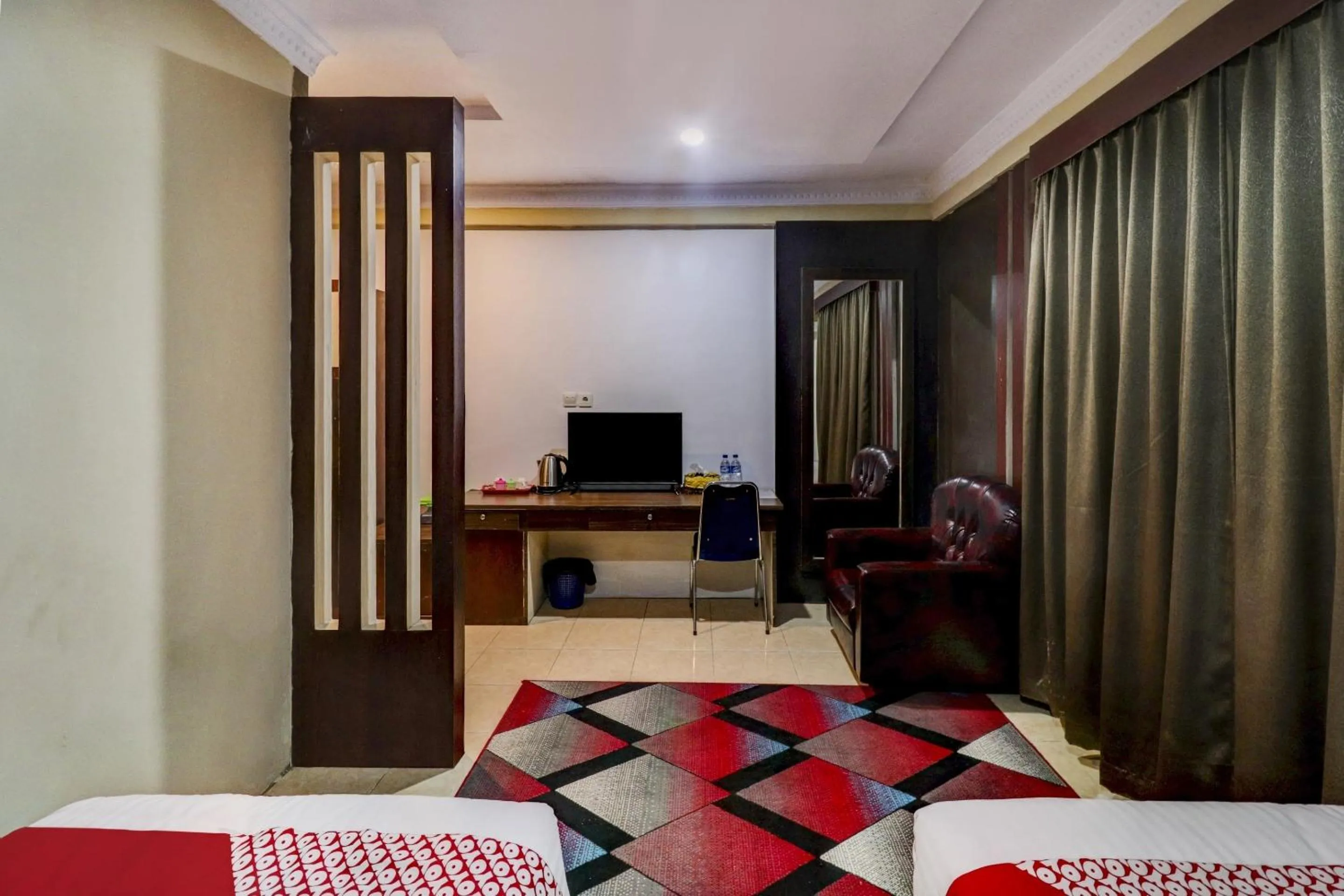 Bedroom in Collection O 90564 Hotel Merangin Syariah