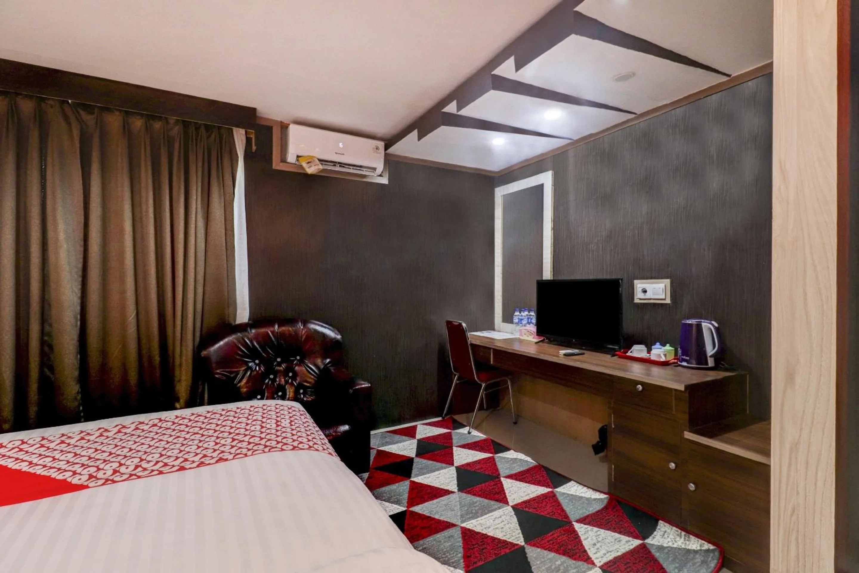 Bedroom in Collection O 90564 Hotel Merangin Syariah