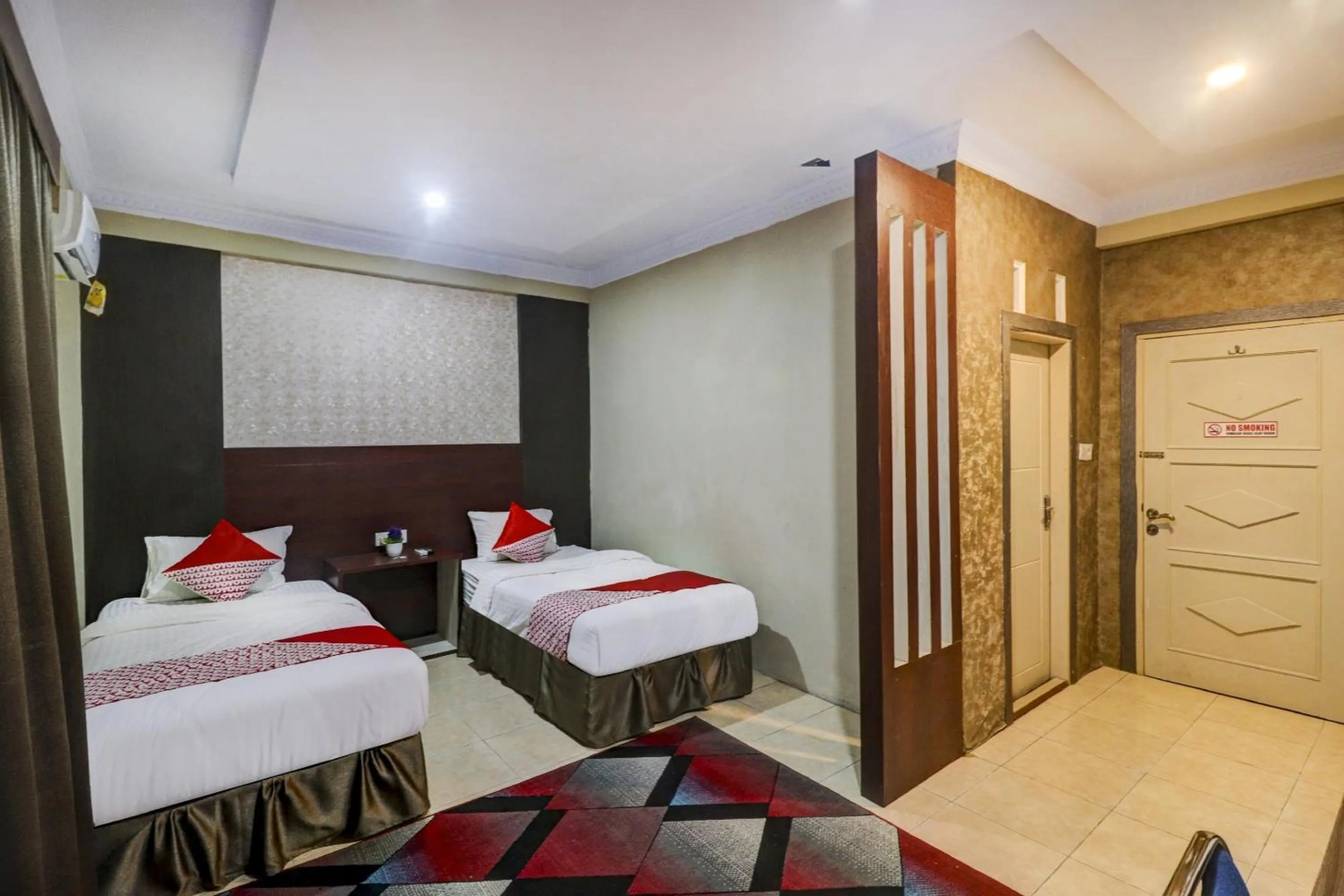 Bedroom in Collection O 90564 Hotel Merangin Syariah