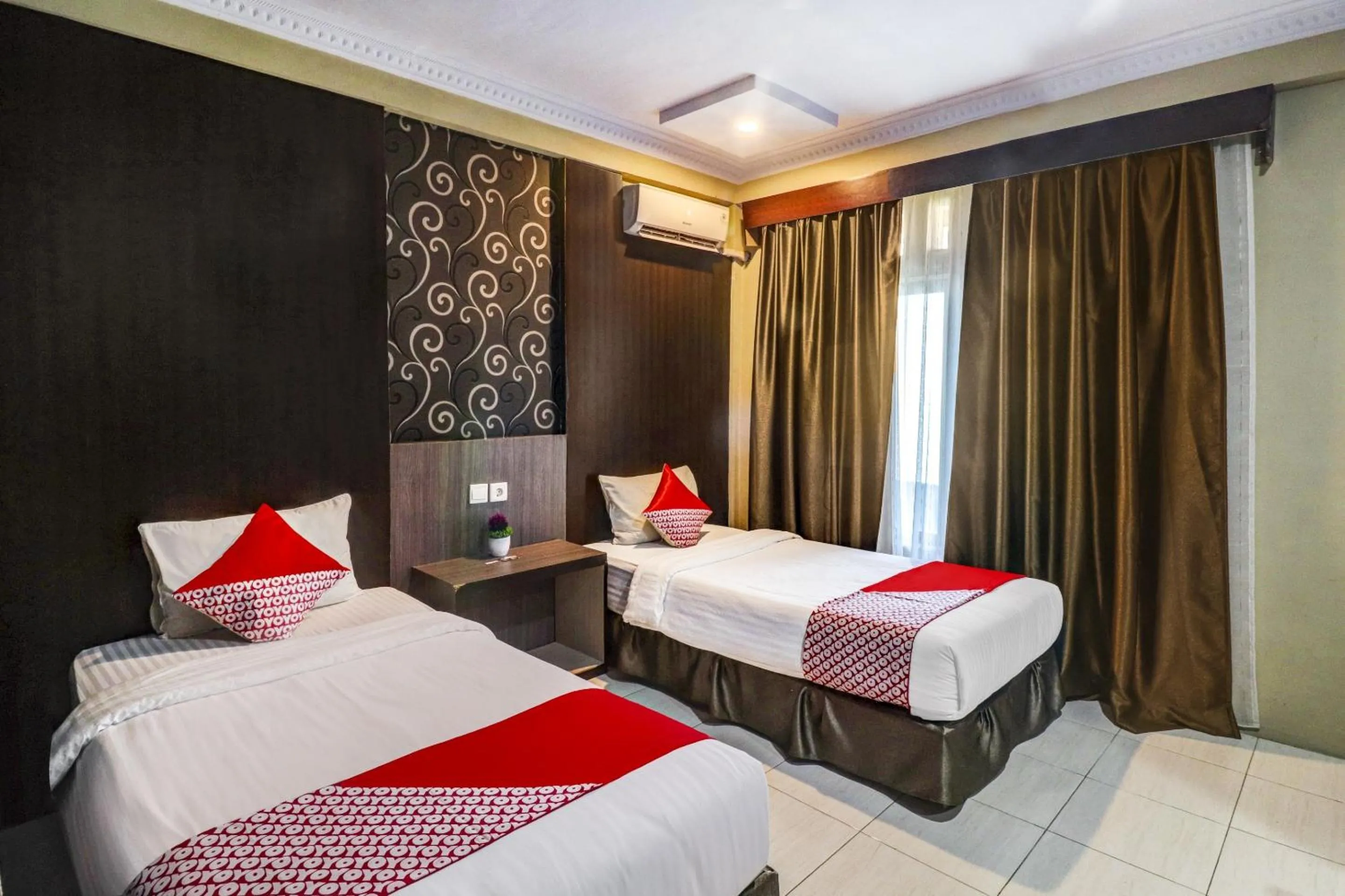 Bedroom in Collection O 90564 Hotel Merangin Syariah