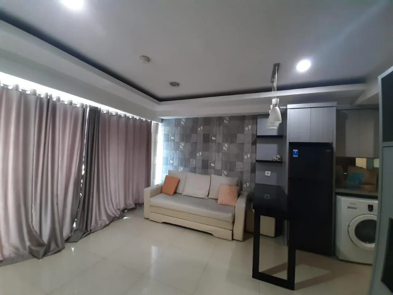 Living room in Cozy Tamansari Hive Cawang by Bonzela Property