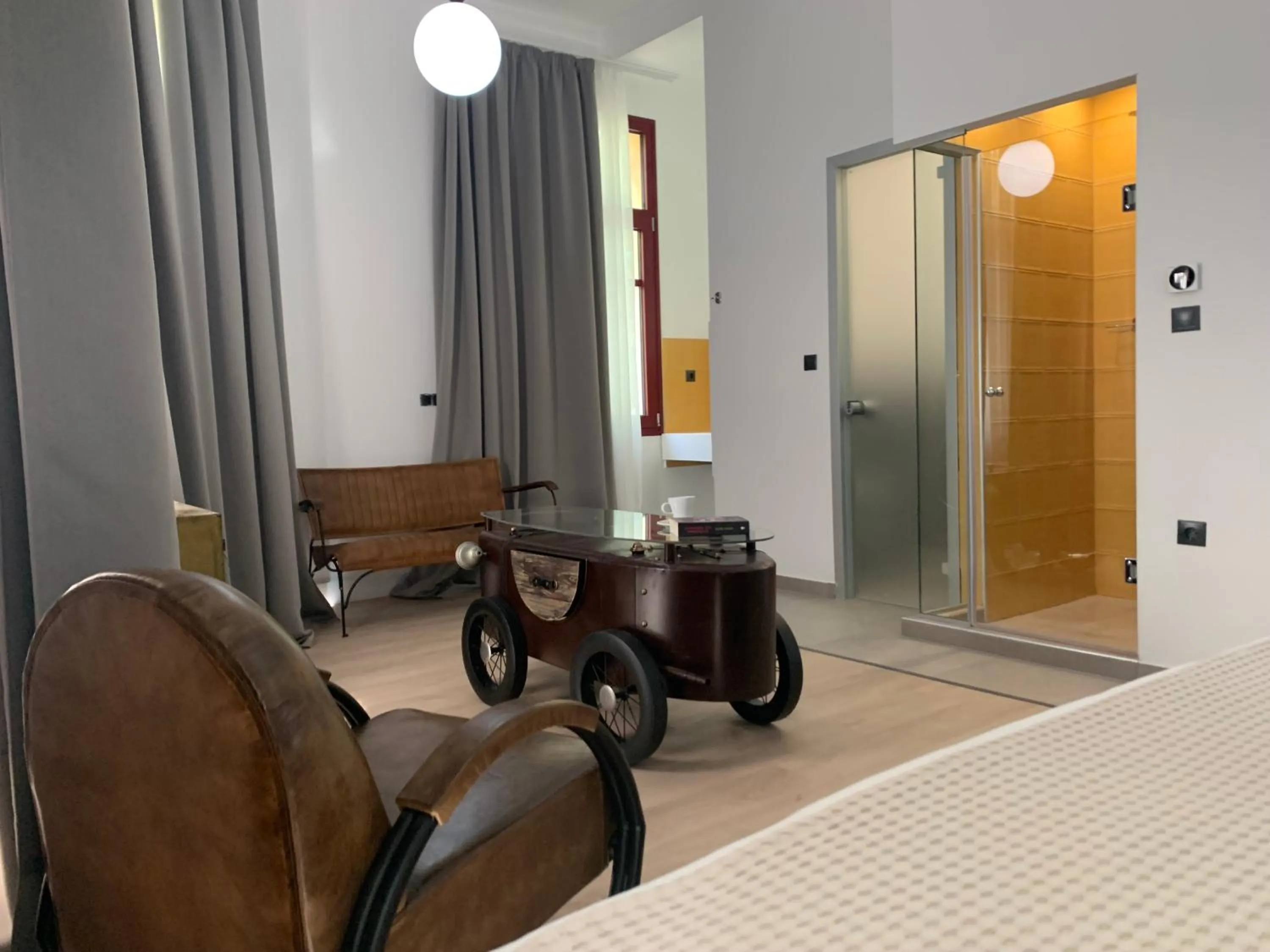 Bed in The Maroon Bottle Luxury Suites