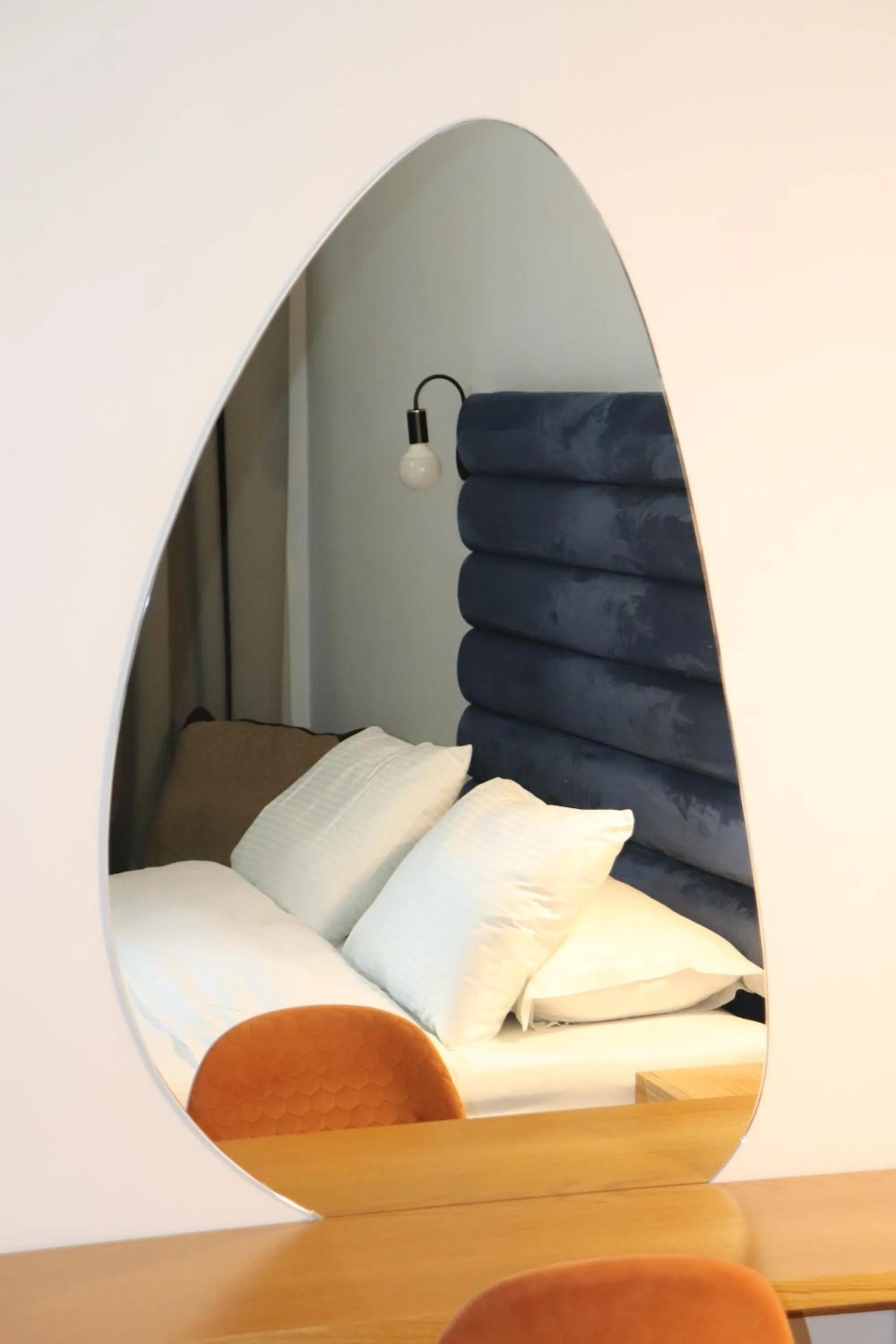 Bed in The Maroon Bottle Luxury Suites