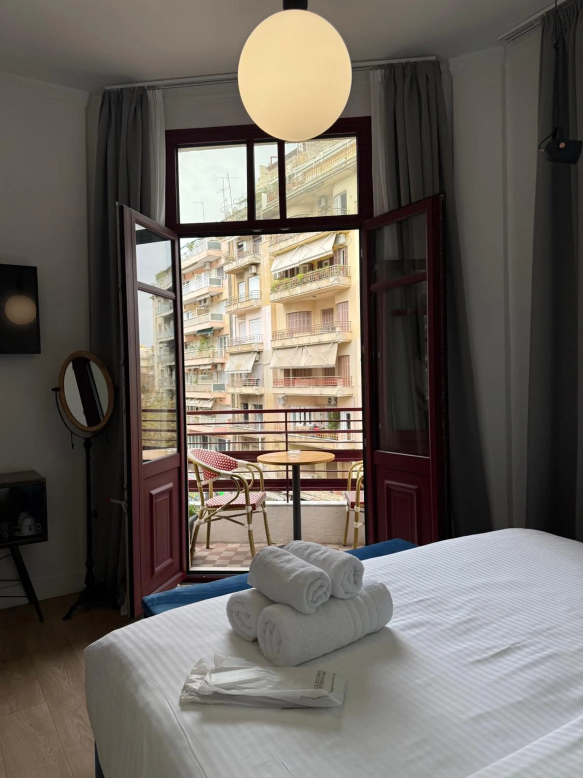 Bed in The Maroon Bottle Luxury Suites