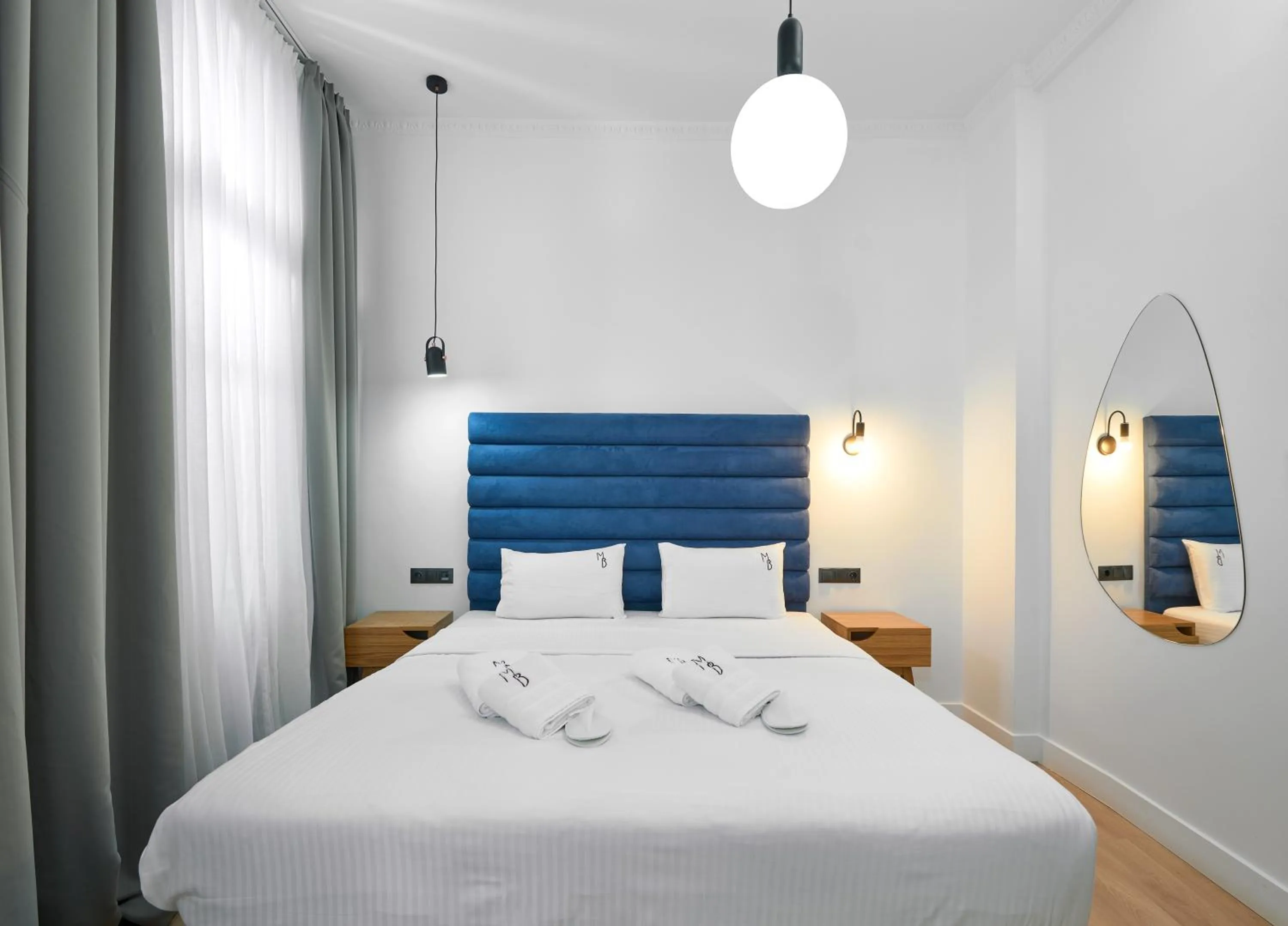 Toilet, Bed in The Maroon Bottle Luxury Suites