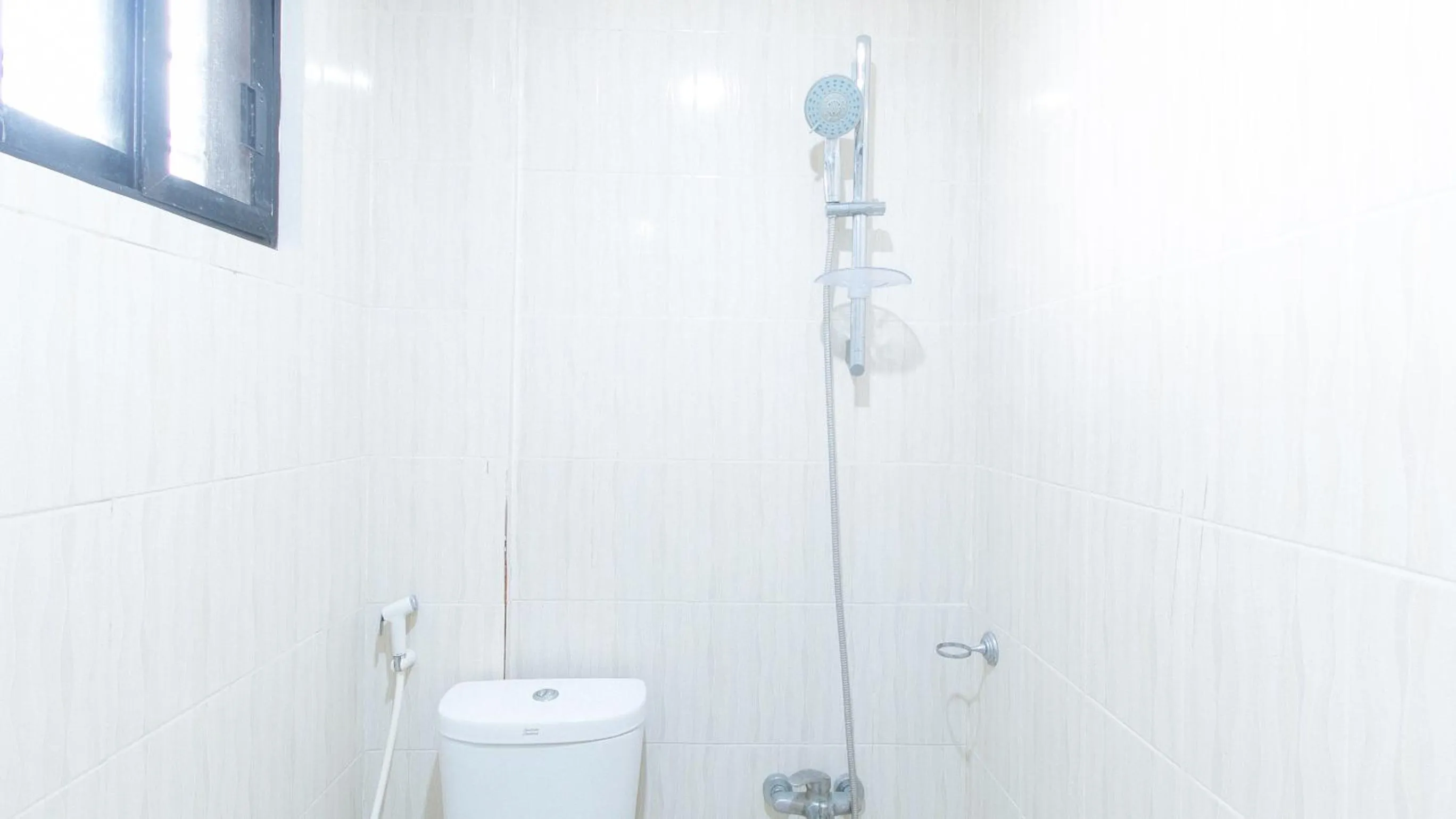 Shower in RedDoorz at RJs Bldg near Lyceum Gen Trias Cavite