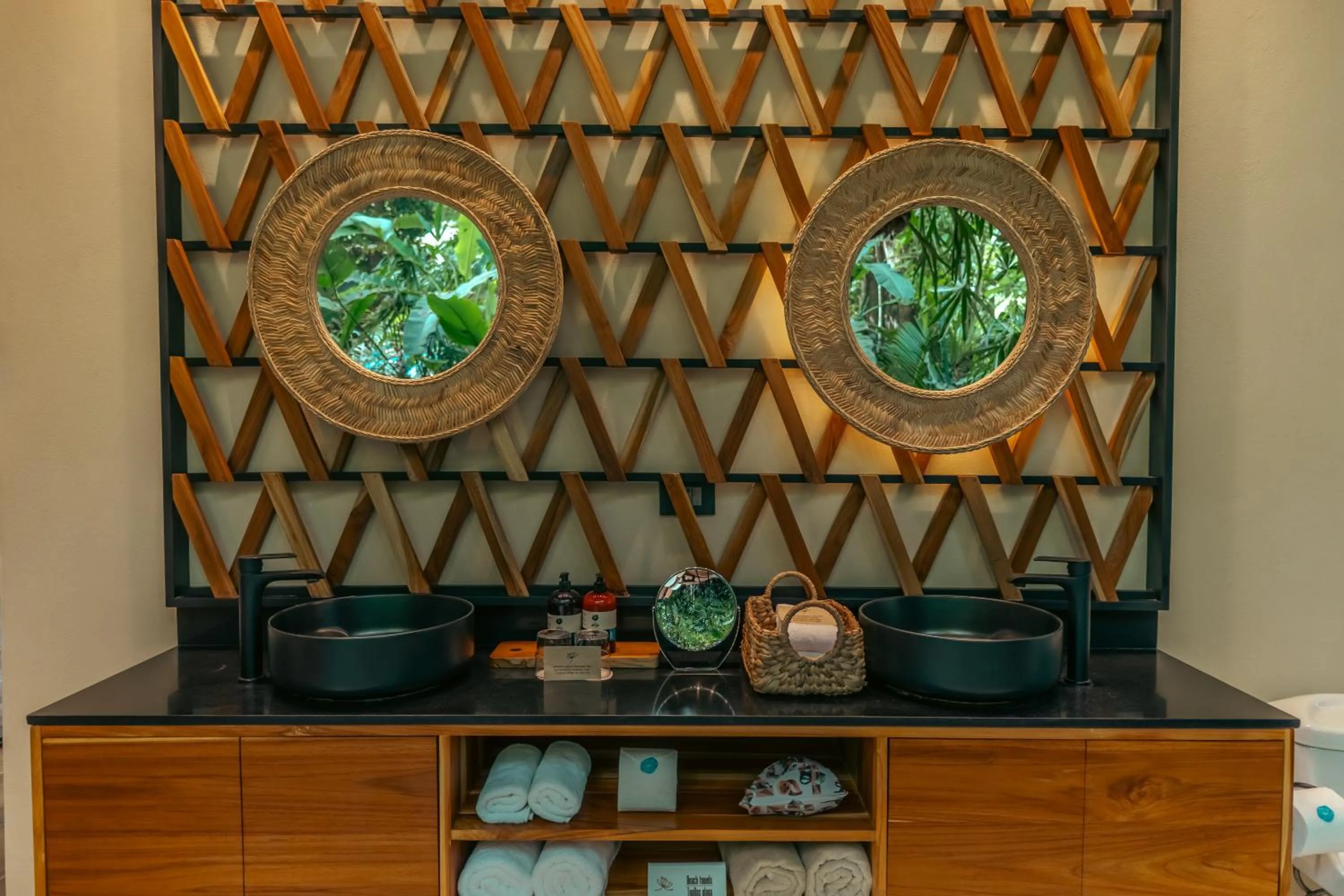 Bathroom in awā Beachfront Hotel