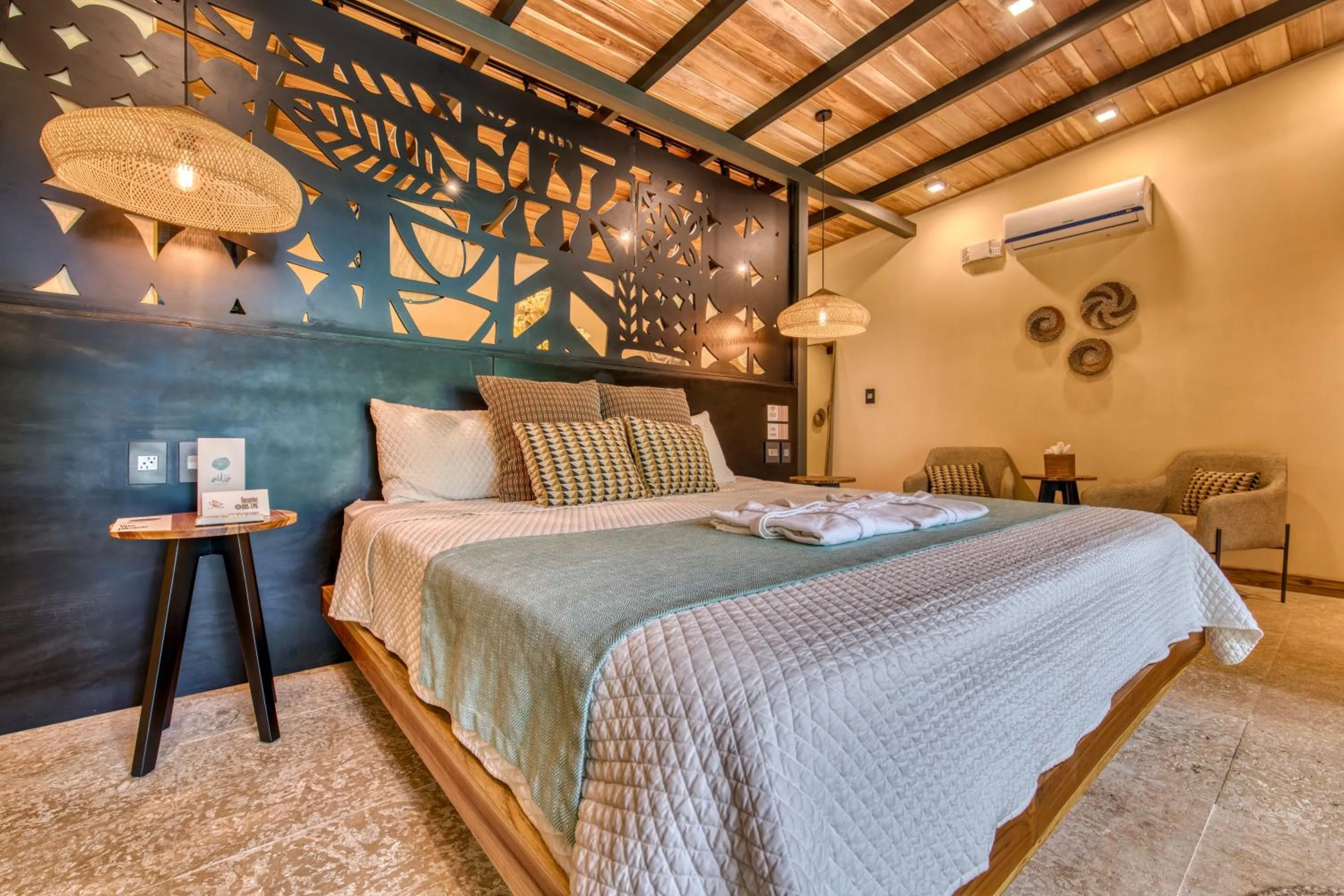 Bed in awā Beachfront Hotel