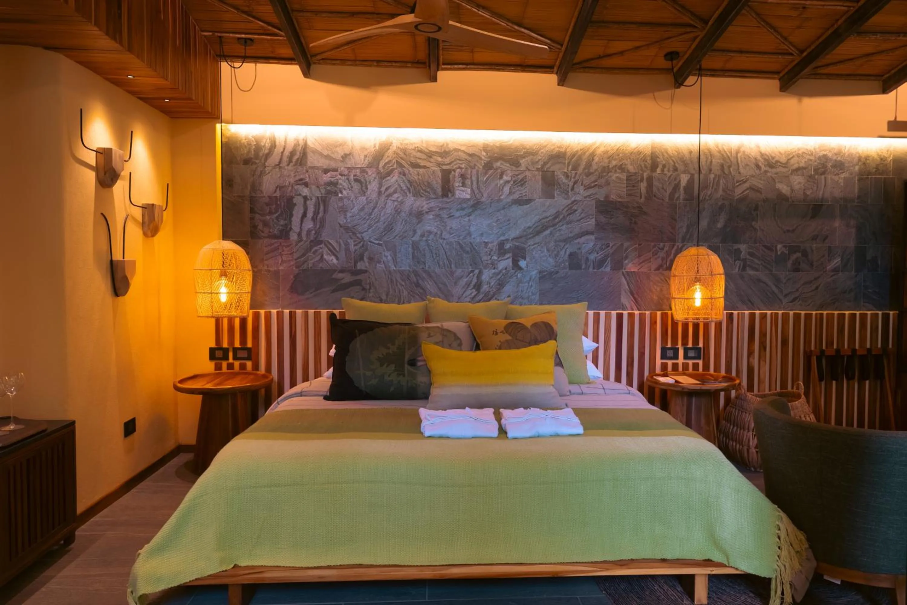 Bed in awā Beachfront Hotel