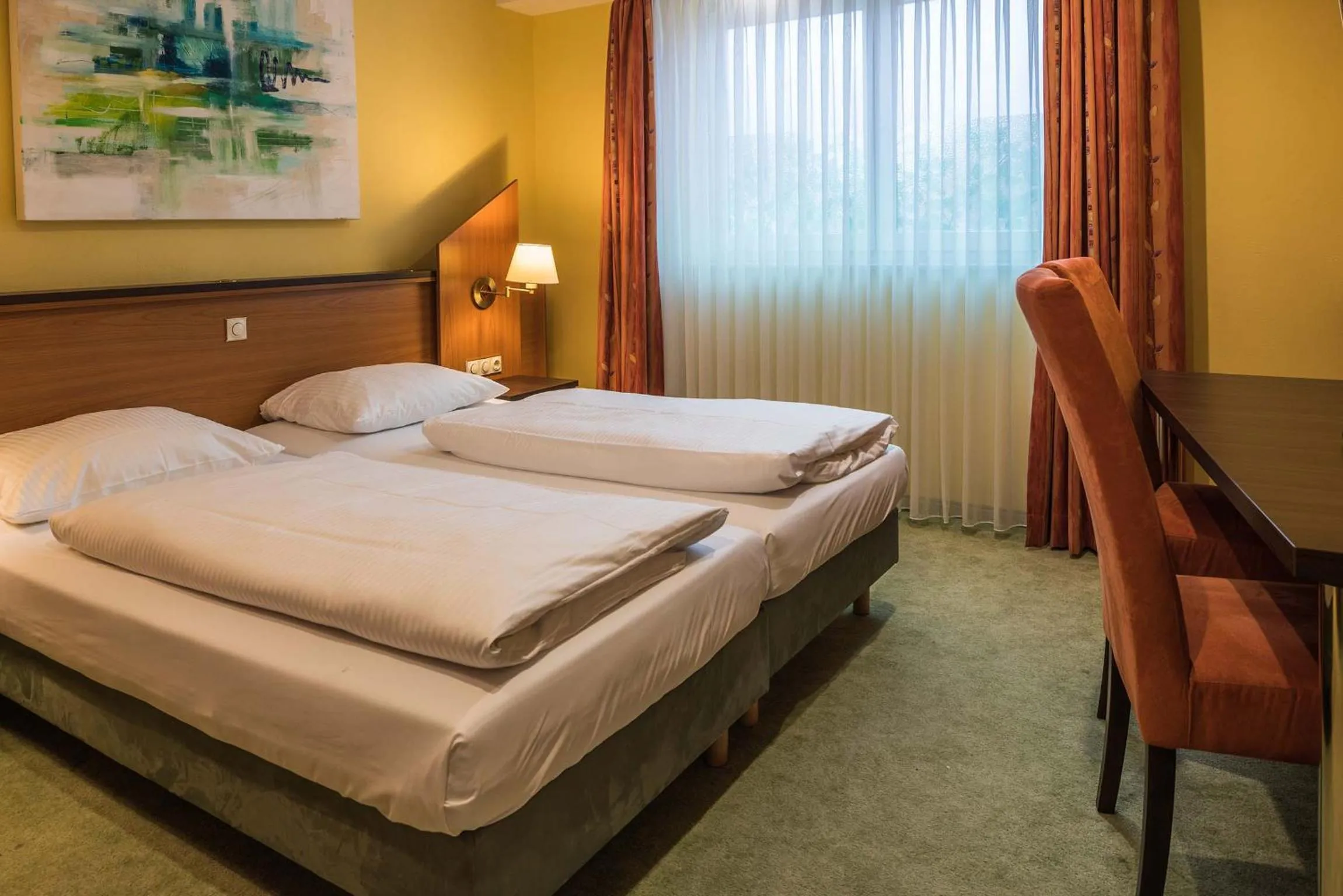 Photo of the whole room, Bed in Hotel Sperling mit E-Ladestation