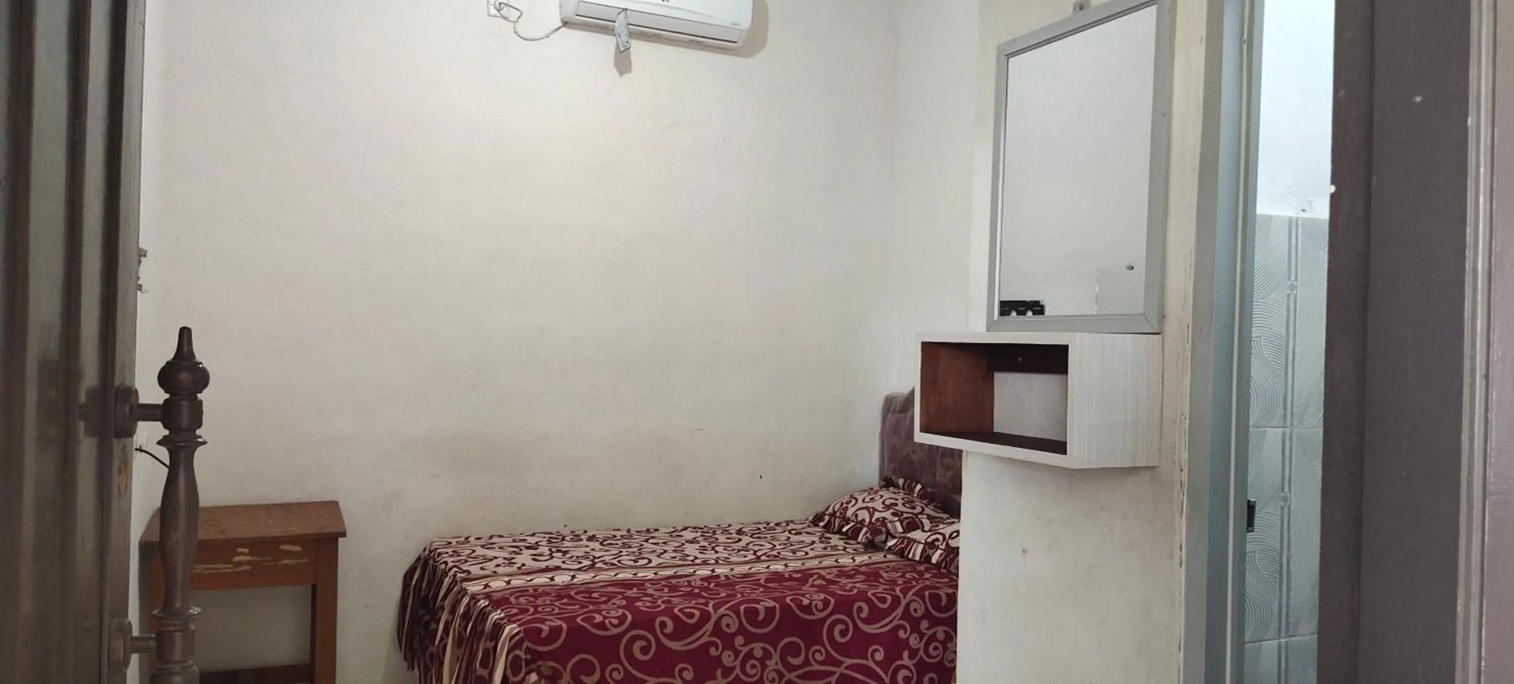 Bed in penginapan karanglaut santolo