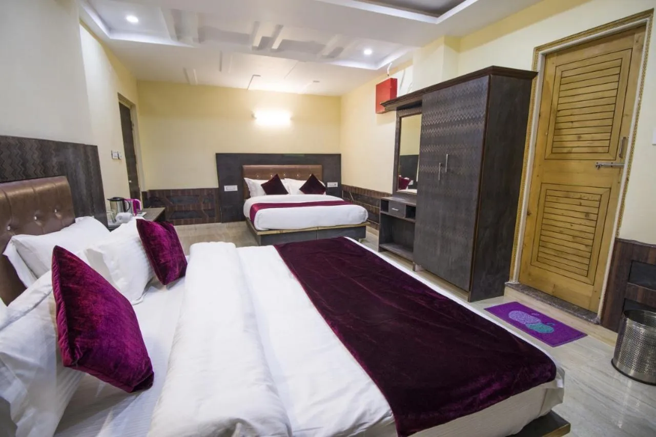 Bedroom, Bed in Vella Marina Group of Hotels Mount-Hotels Best Prices Guaranteed with Deals- Free Parking-cricket stadium 10 km-Mcleodganj 2 km- Bhagsunag 4 km