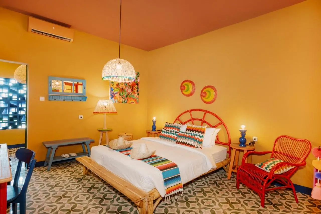 Bed in Por Aqui Stay & Dine