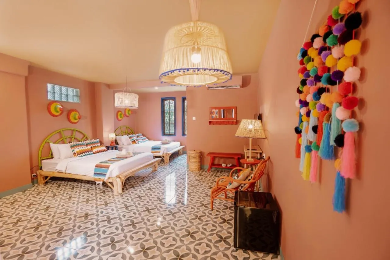 Bed in Por Aqui Stay & Dine