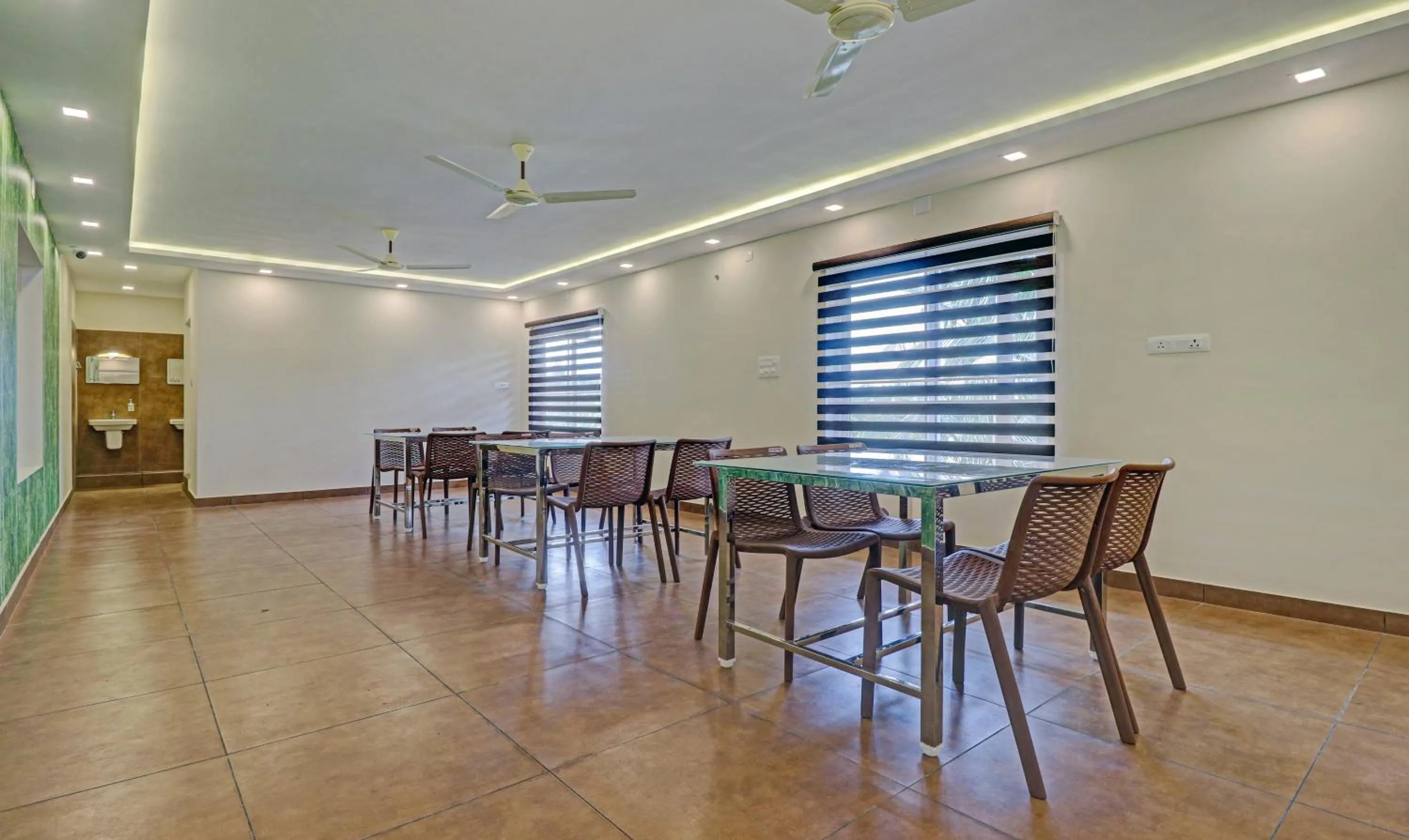 Dining area in Treebo Golden Terminal, Kochi Airport