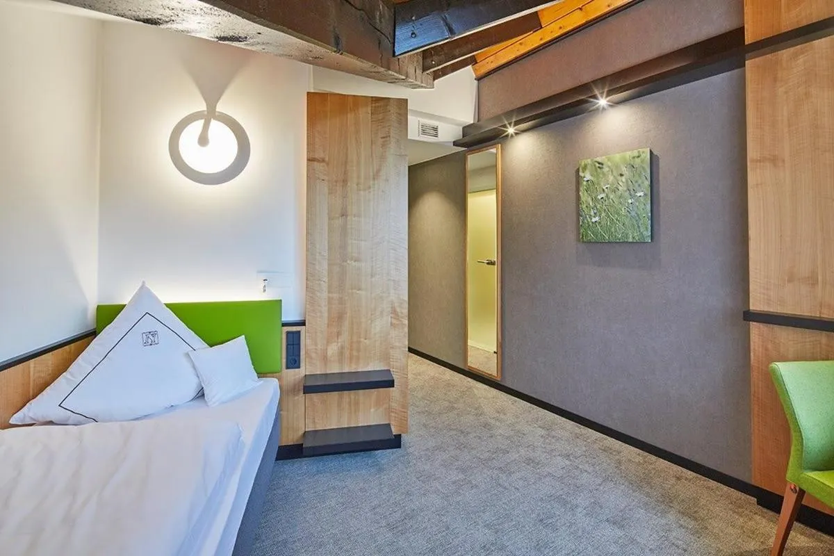 Bed in Landhotel Naafs-Häuschen