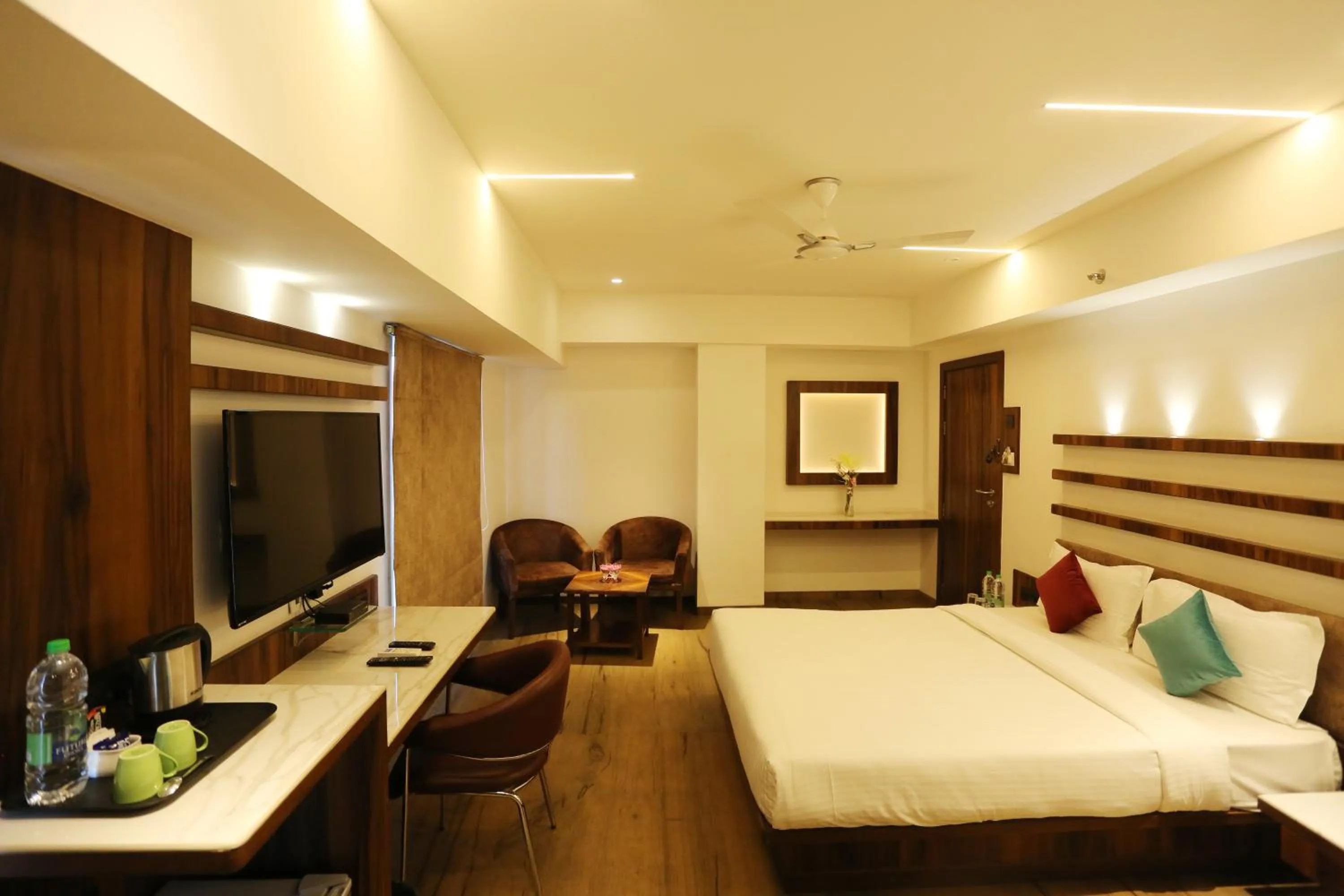 Photo of the whole room, Bed in Pravasa hotel Indore