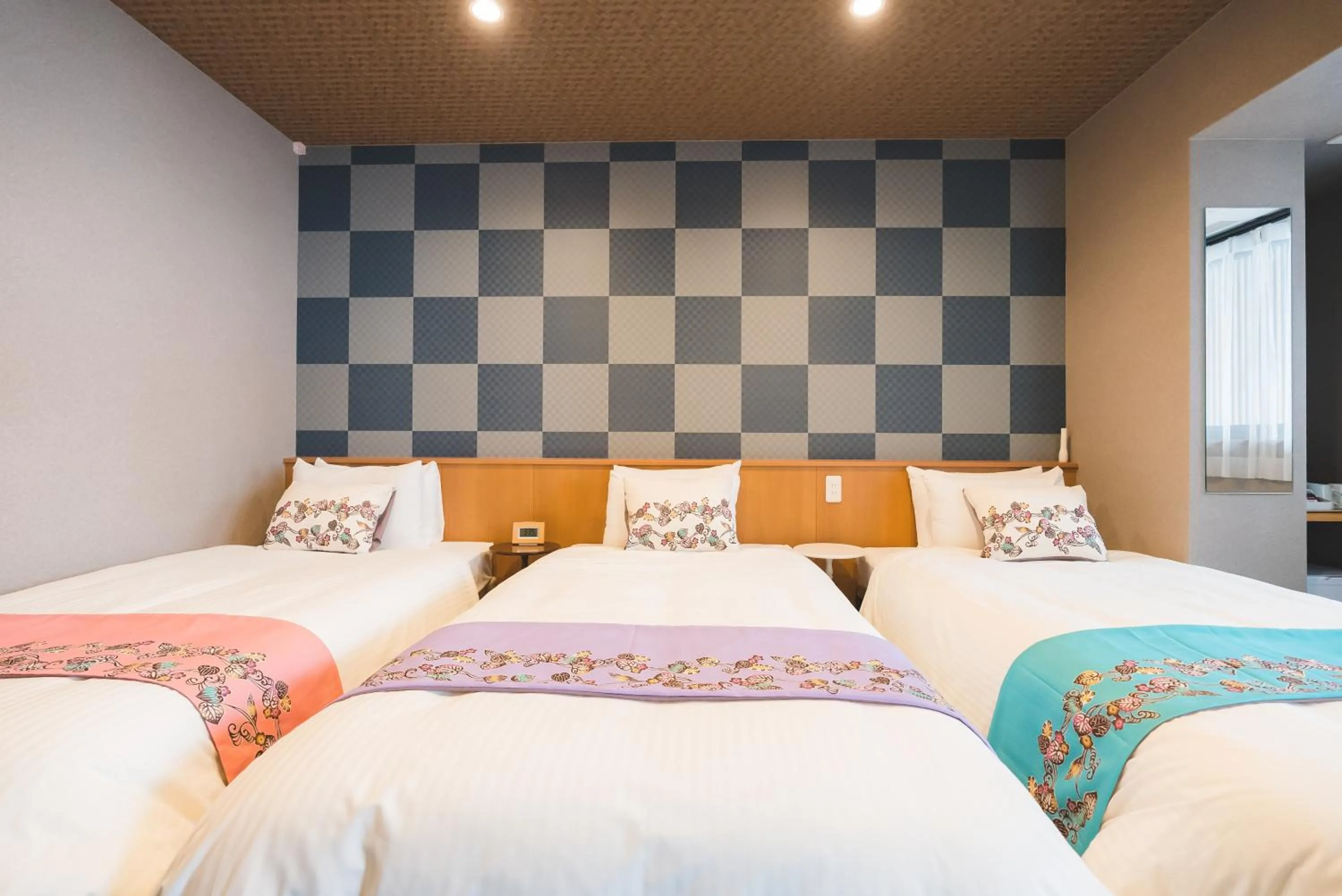 Bed in Kyoto Earth Hotel