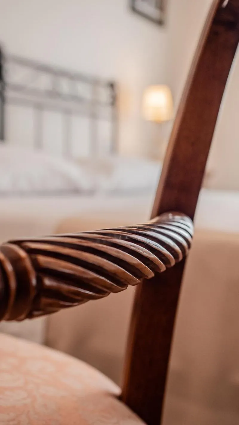 Decorative detail, Bed in Palazzo dei Pavoni, Relais di Charme