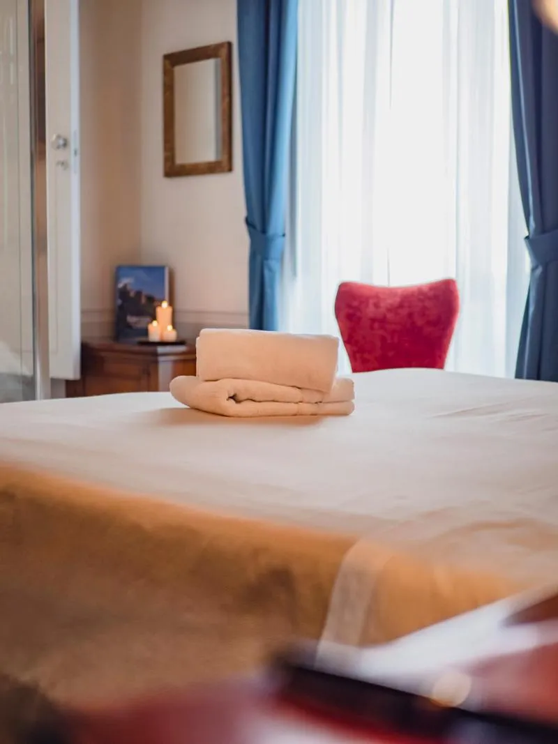 Bed in Palazzo dei Pavoni, Relais di Charme