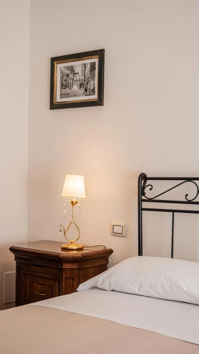 Bed in Palazzo dei Pavoni, Relais di Charme