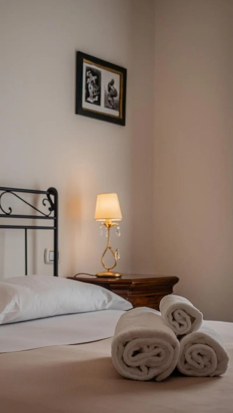 Bed in Palazzo dei Pavoni, Relais di Charme