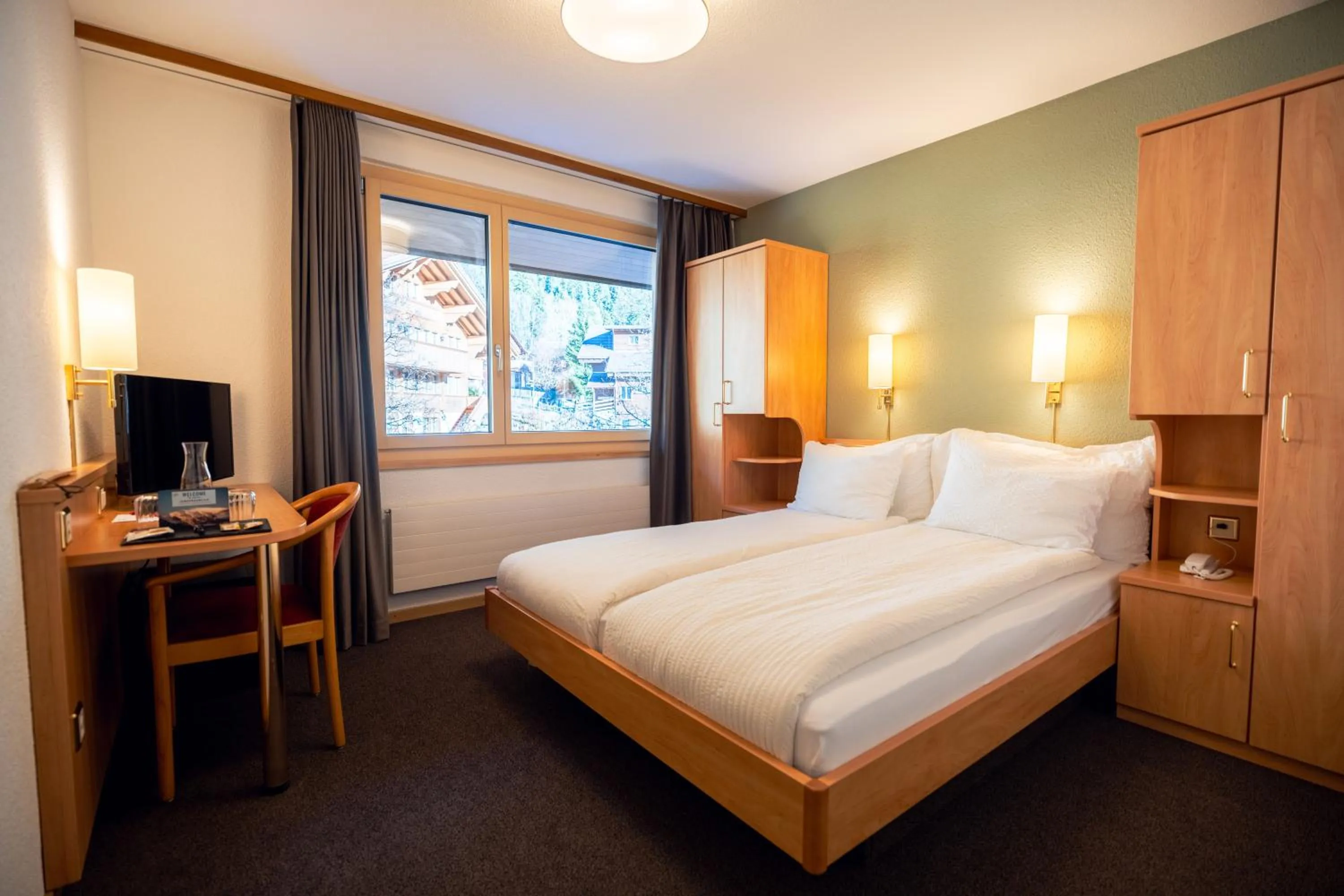 Bedroom, Bed in Hotel Jungfraublick