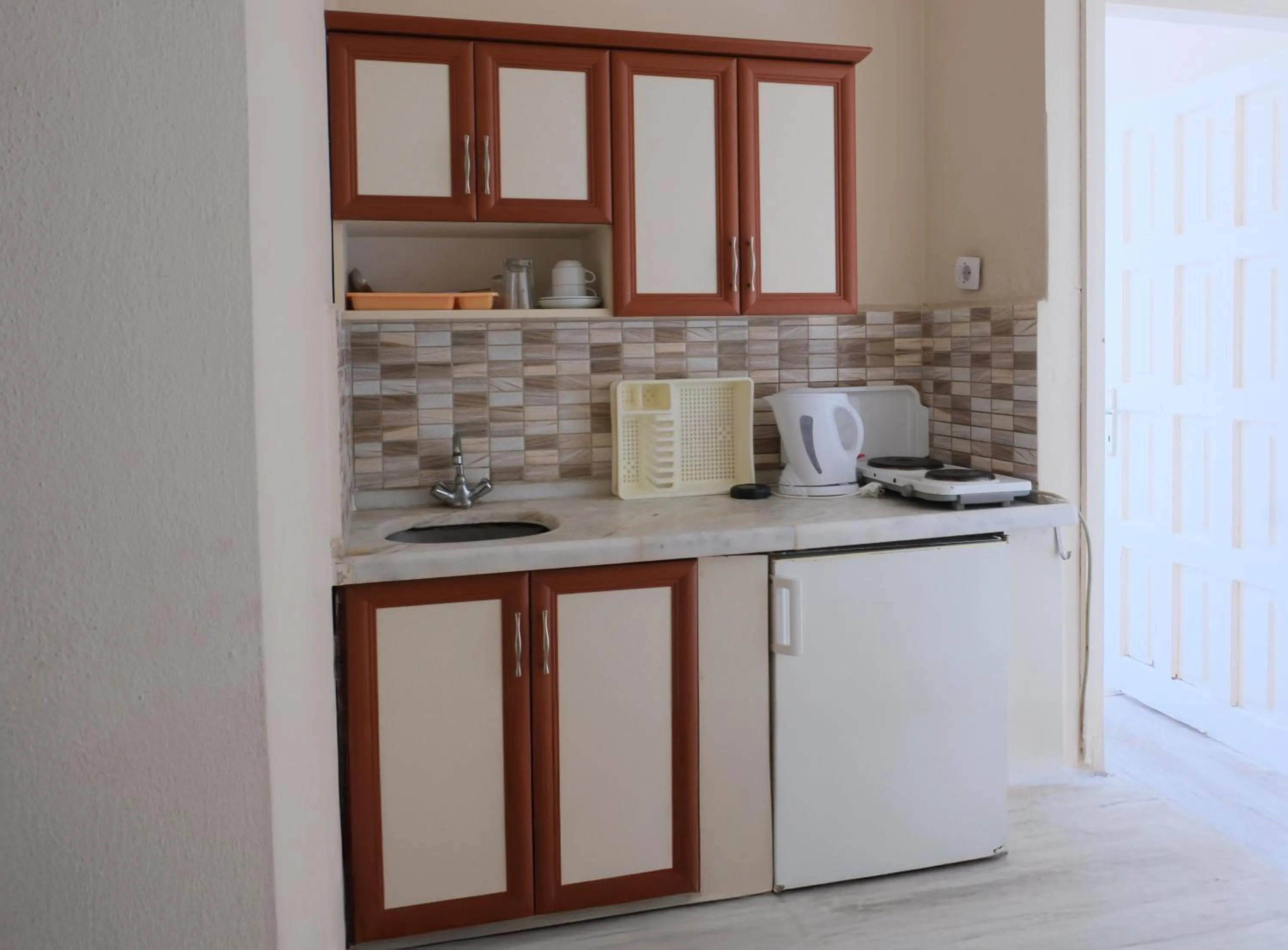 Kitchen or kitchenette in İSABELLA APART OTEL