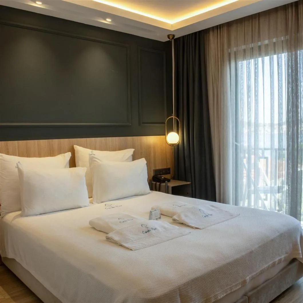 Bed in CUNDA PİER OTEL