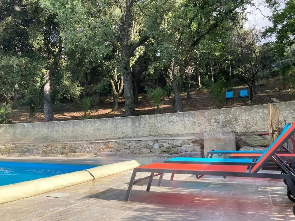 Swimming pool in Suite Royale- SPA - Jacuzzi - Sauna - Massage - 2 Double Rooms - 4 SAISONS - Piscine Chauffée Toute l'année - POOL VIEW - Heated POOL -800m City Centre