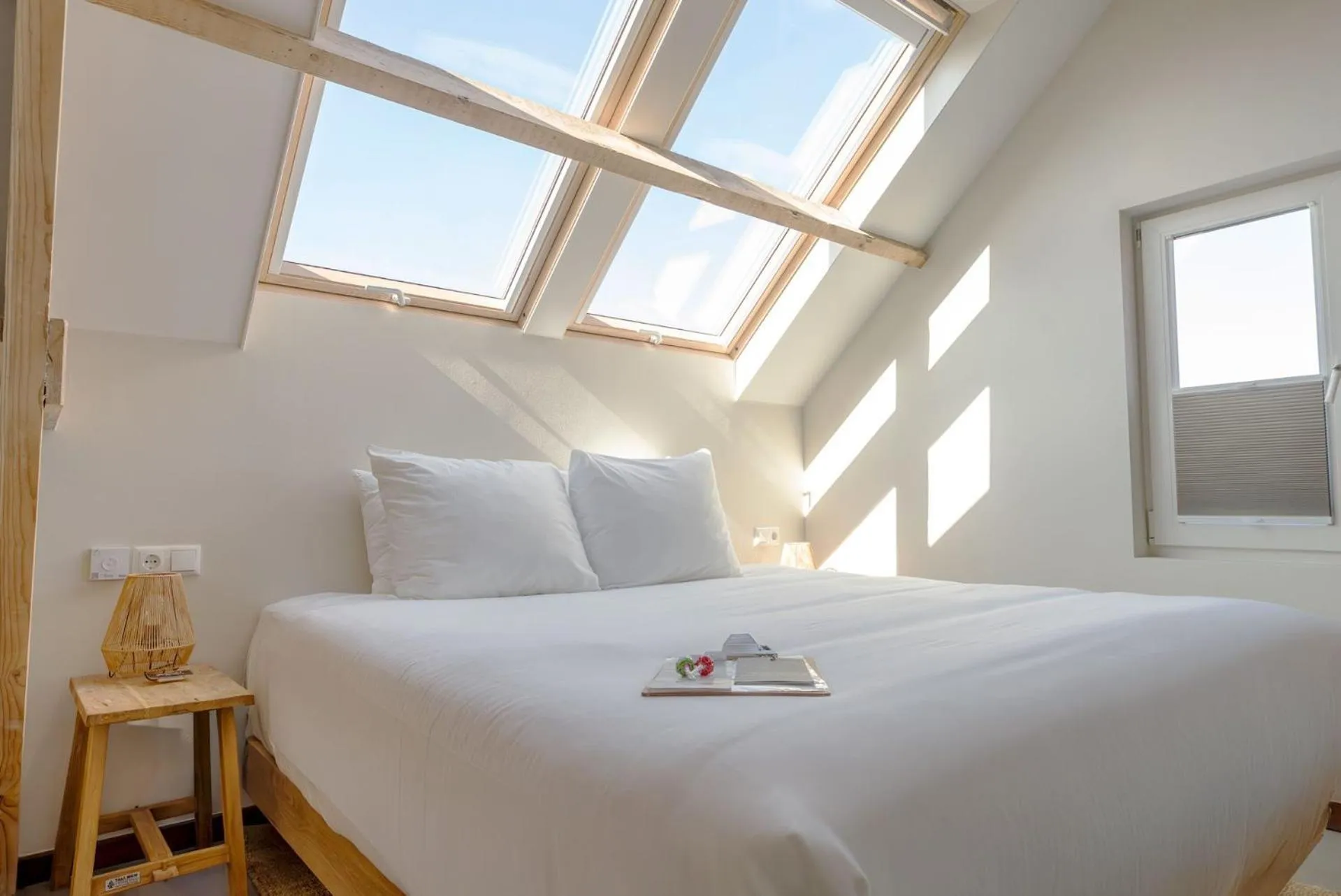 Bed in Van Heeckeren Apartments & Suites Buren