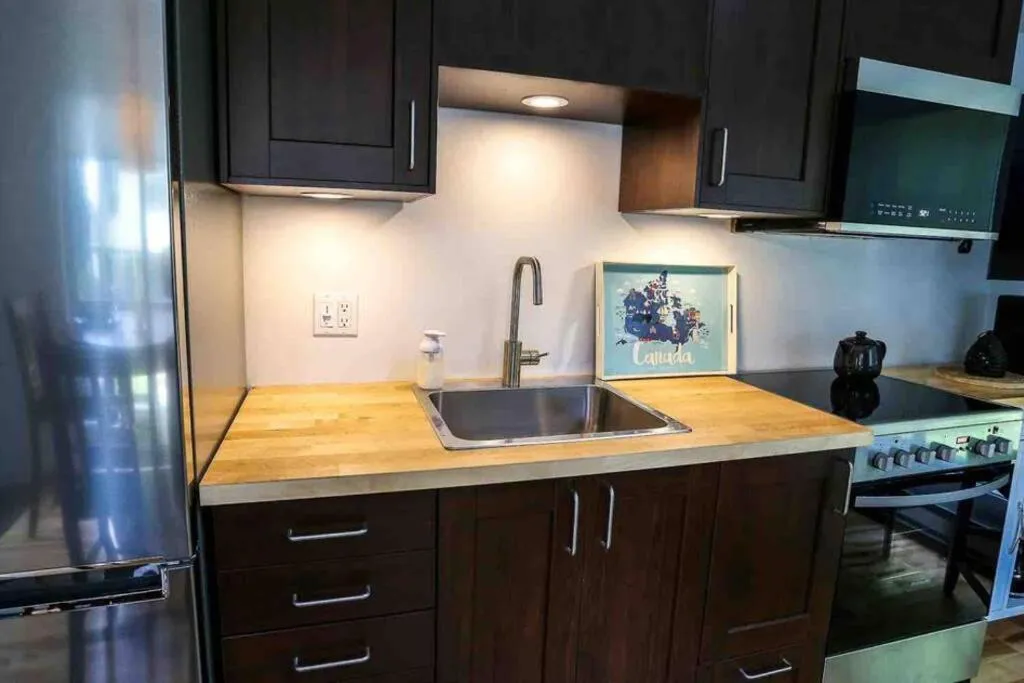 Kitchen or kitchenette in The MountainSide by Escapades Tremblant