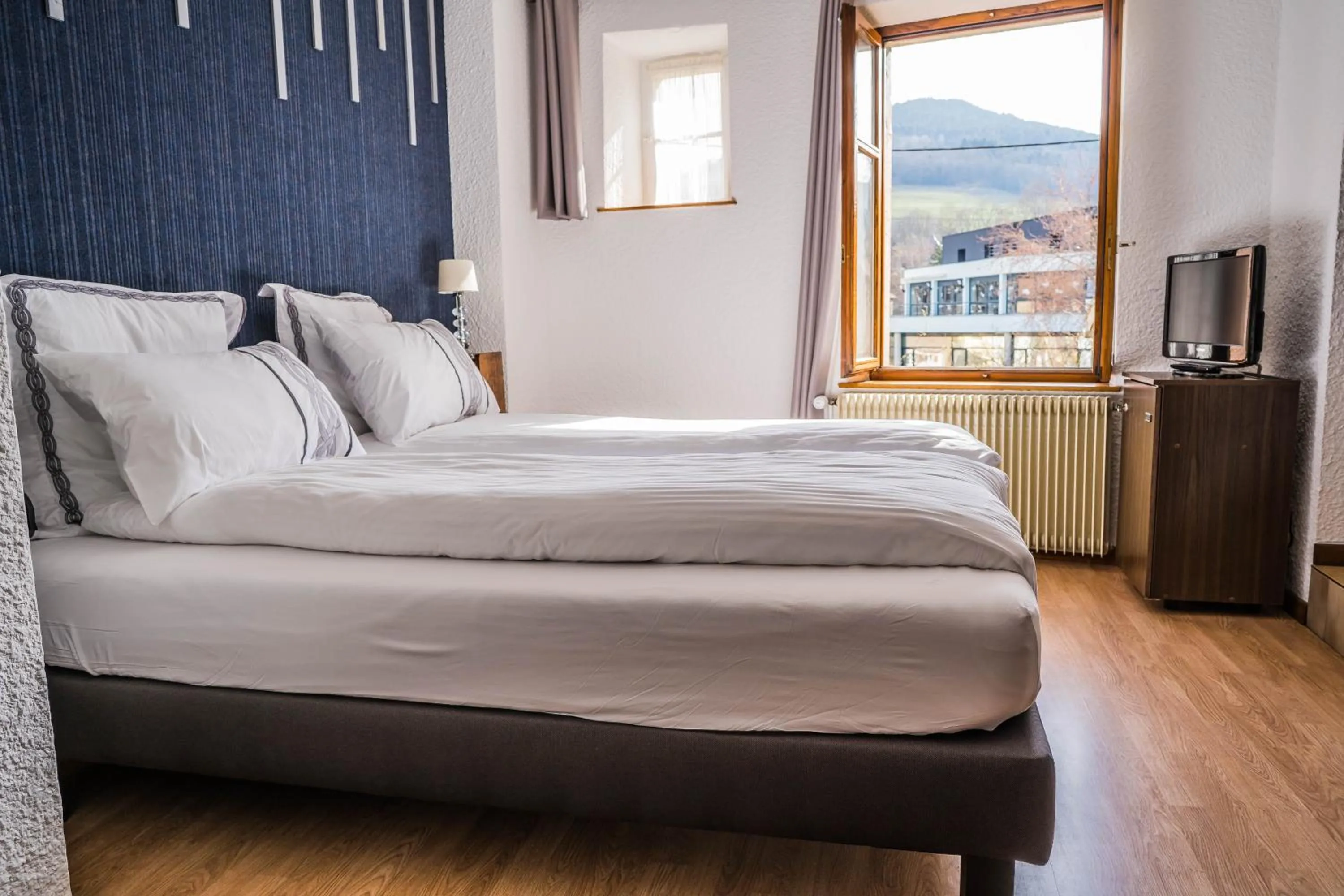 Bed in Hôtel Au Vieux Moulin