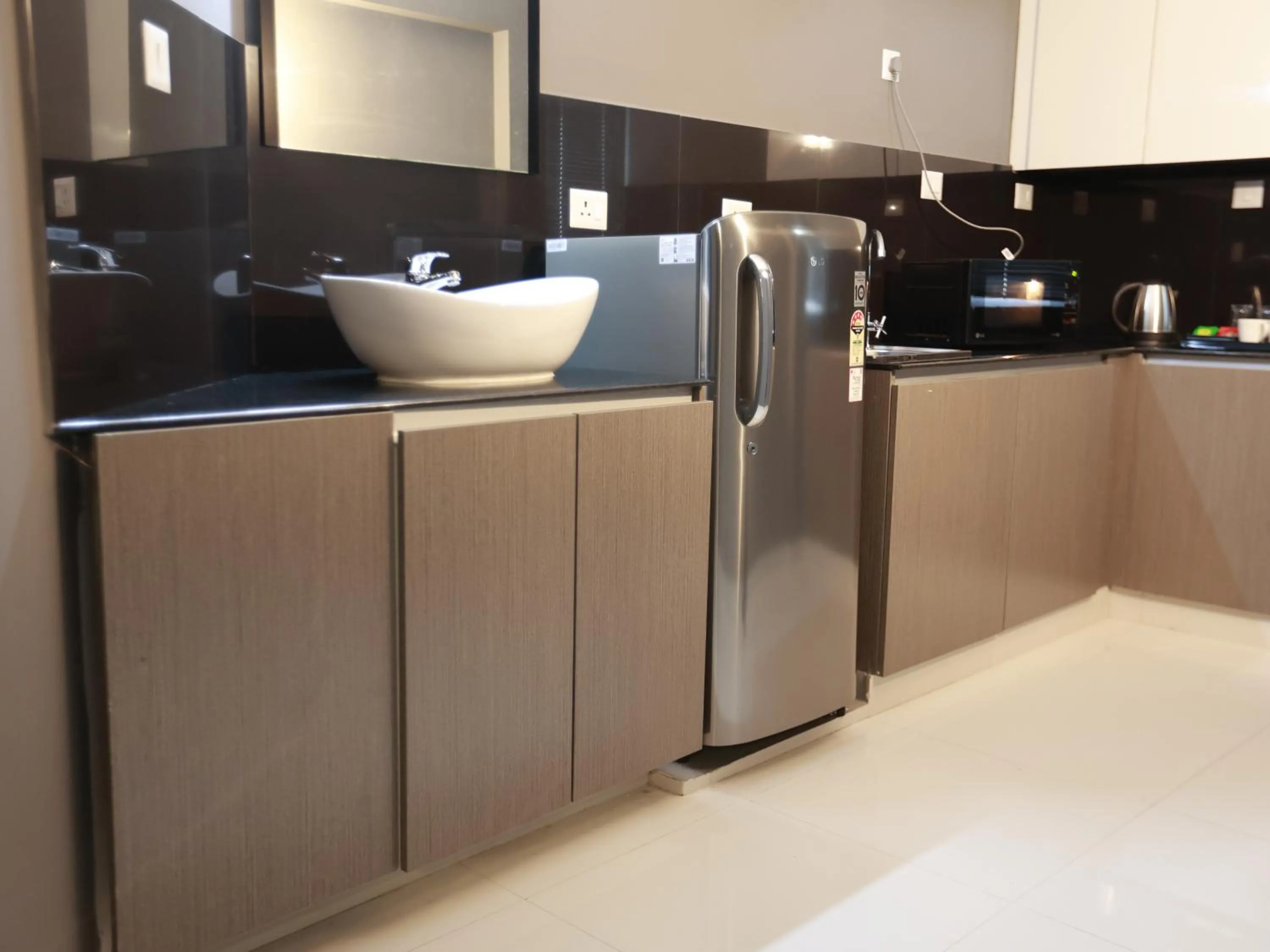 Kitchen or kitchenette in Transit Suites by GrandWest
