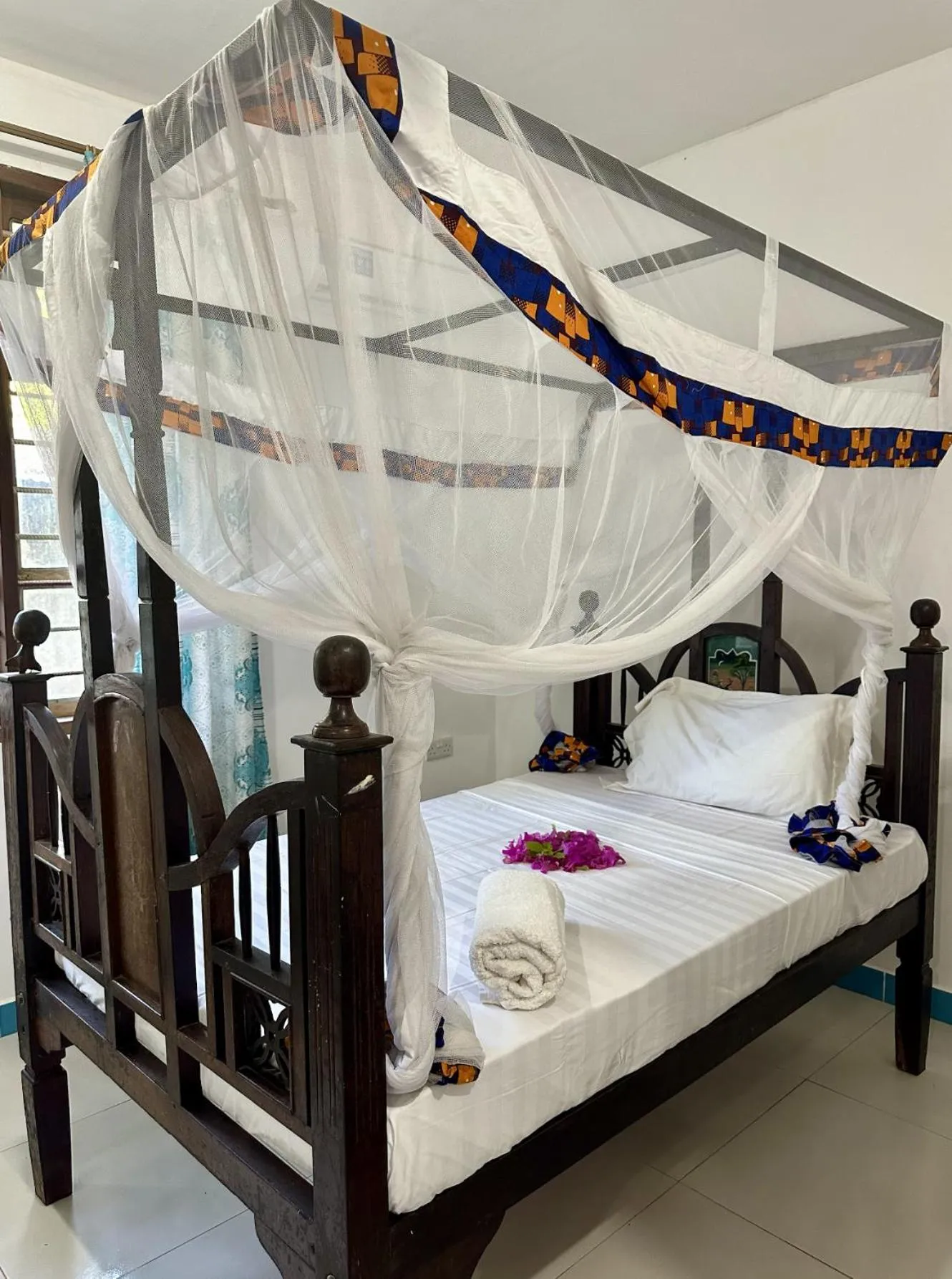 Bed in Khadija Kiwengwa Apartment