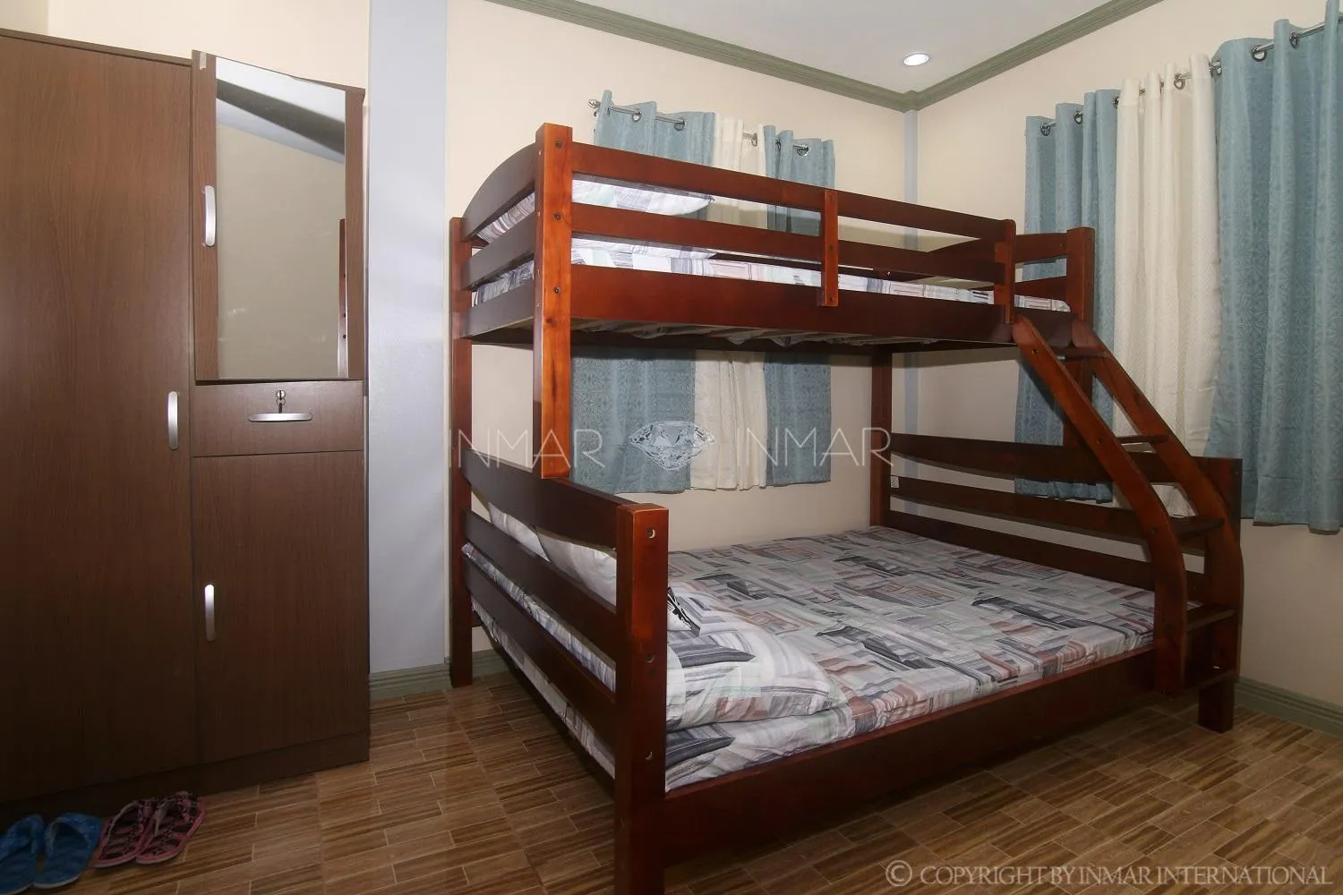 bunk bed in AJ Residences Apartelle