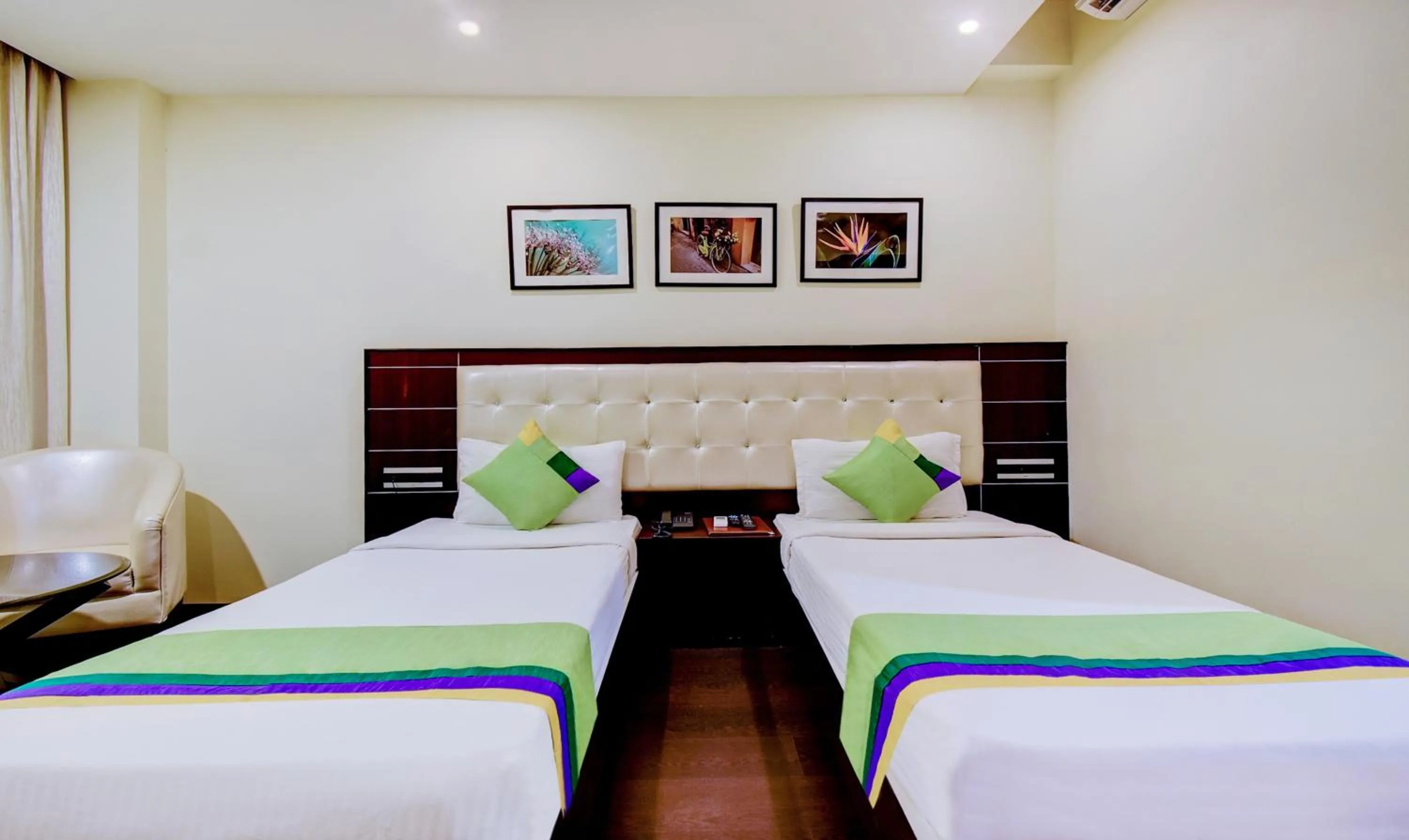 Bedroom, Bed in Treebo Primeland Suites