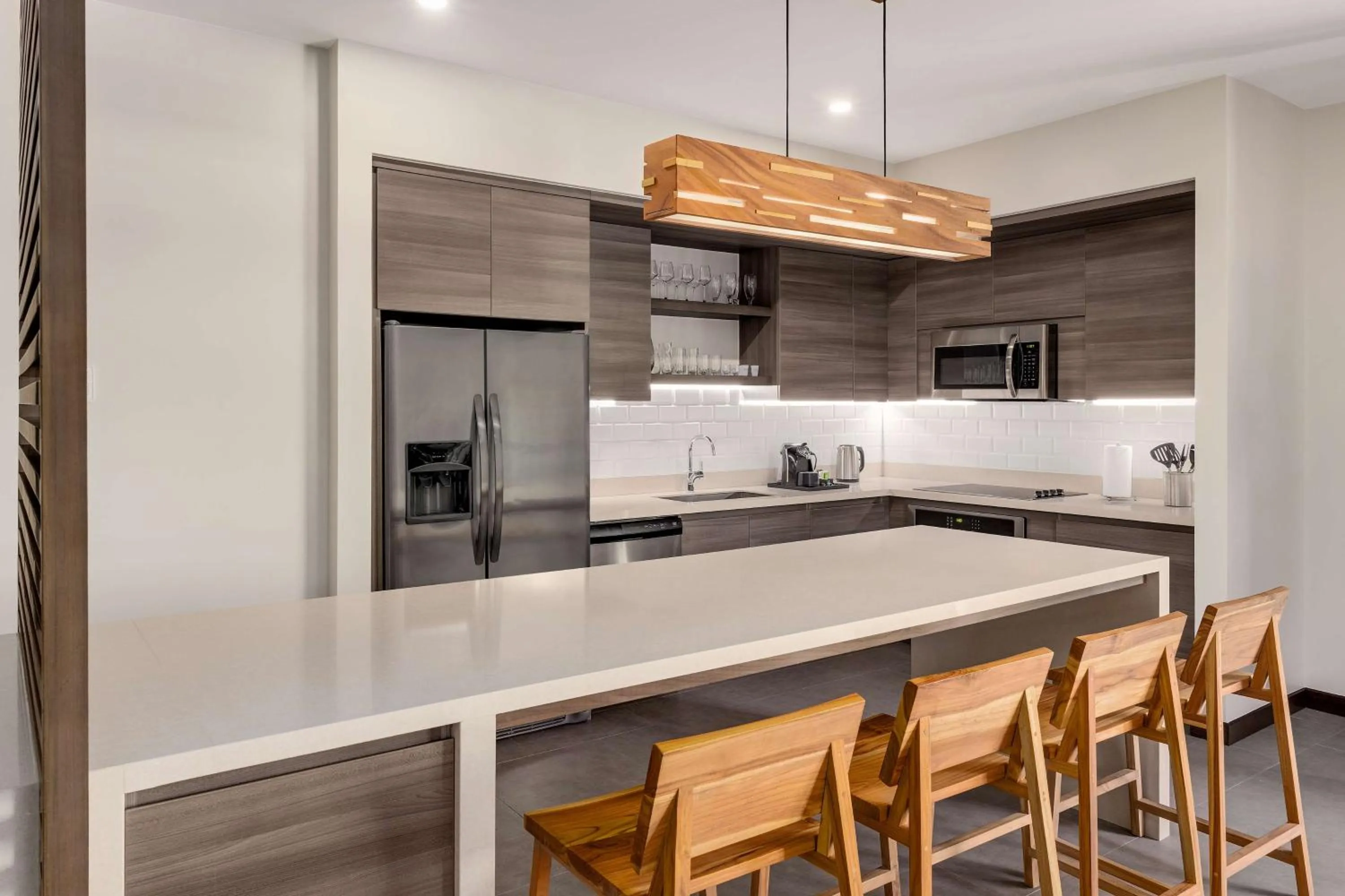 Kitchen or kitchenette in Botanika Osa Peninsula, Curio Collection By Hilton