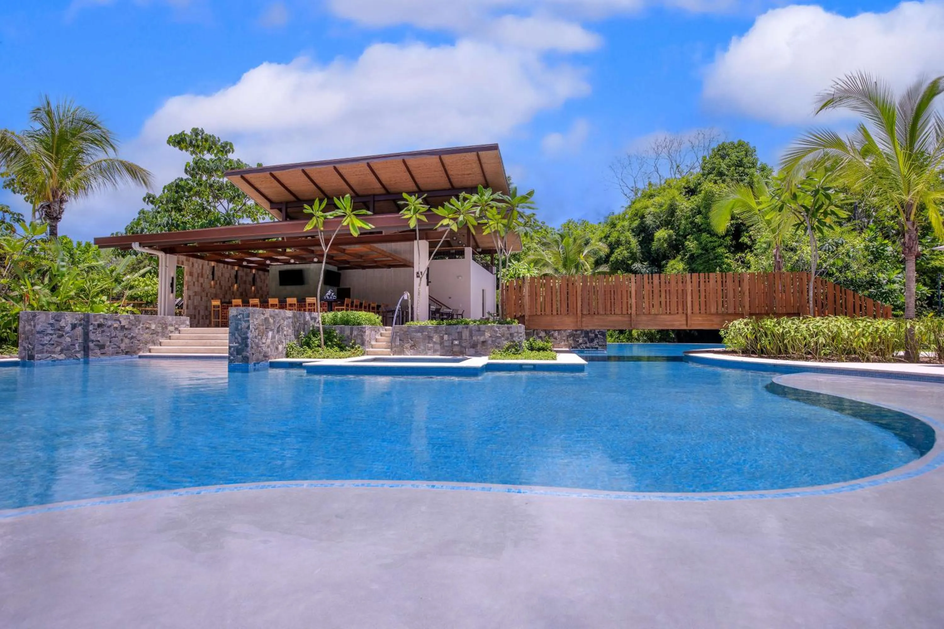 Pool view in Botanika Osa Peninsula, Curio Collection By Hilton